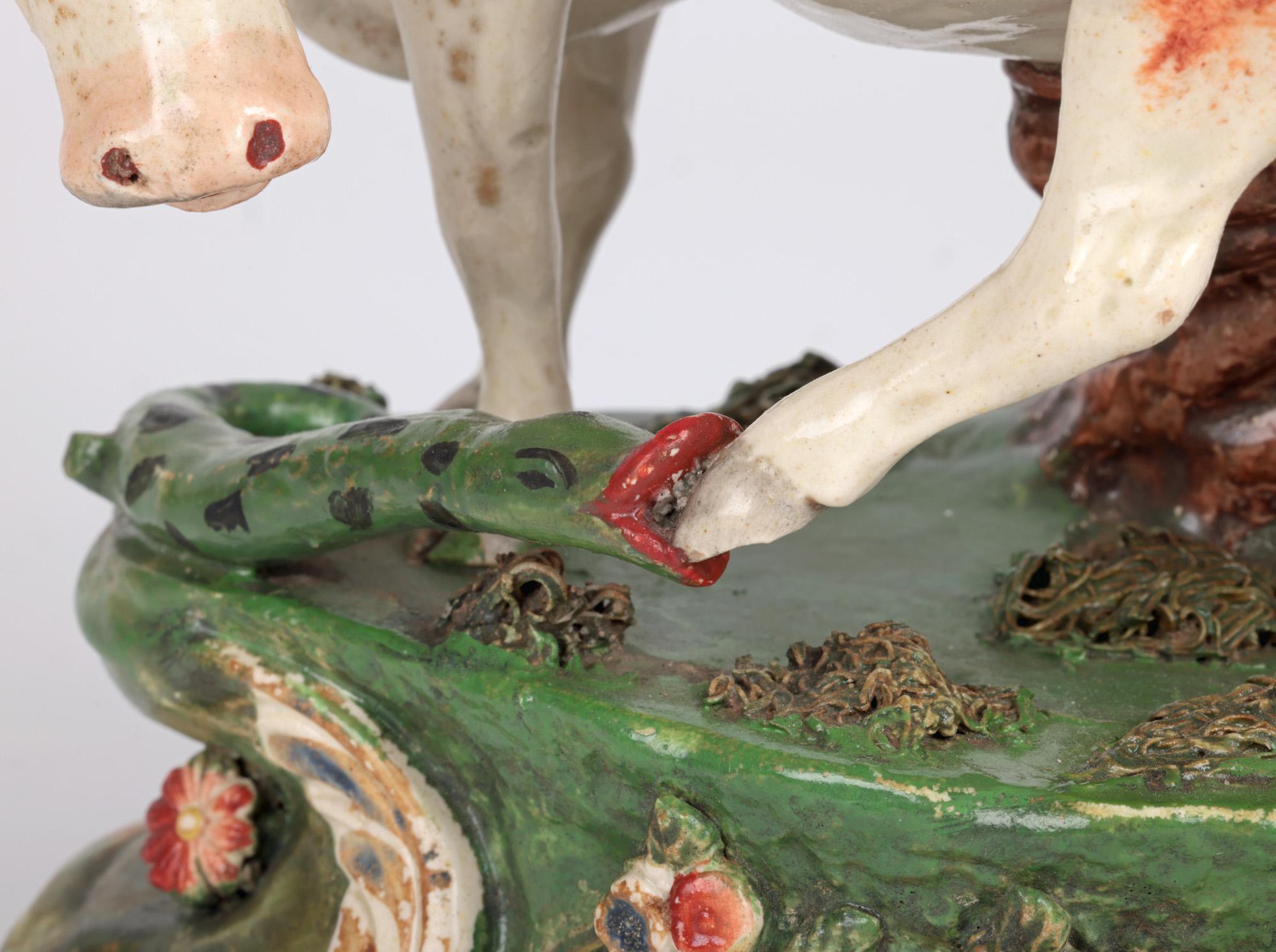 Staffordshire Pottery Cow Attacked by a Snake Pottery Figure 1