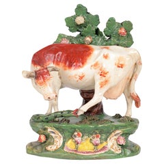Staffordshire Pottery Cow Attacked by a Snake Pottery Figure