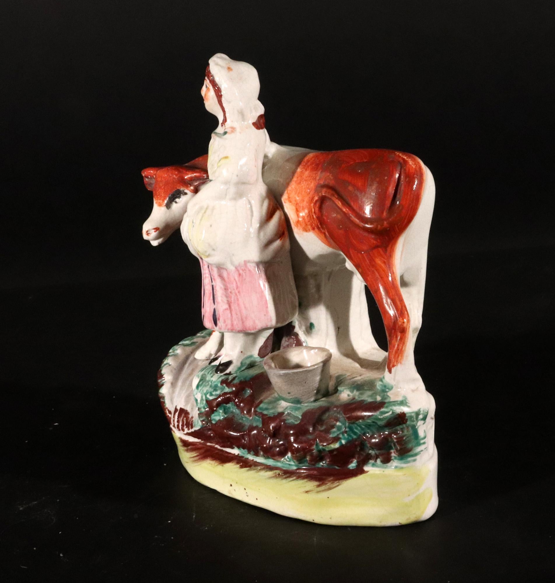 Staffordshire Pottery Cow Figure with Milkmaid For Sale 1