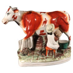 Staffordshire Pottery Cow Figure with Milkmaid