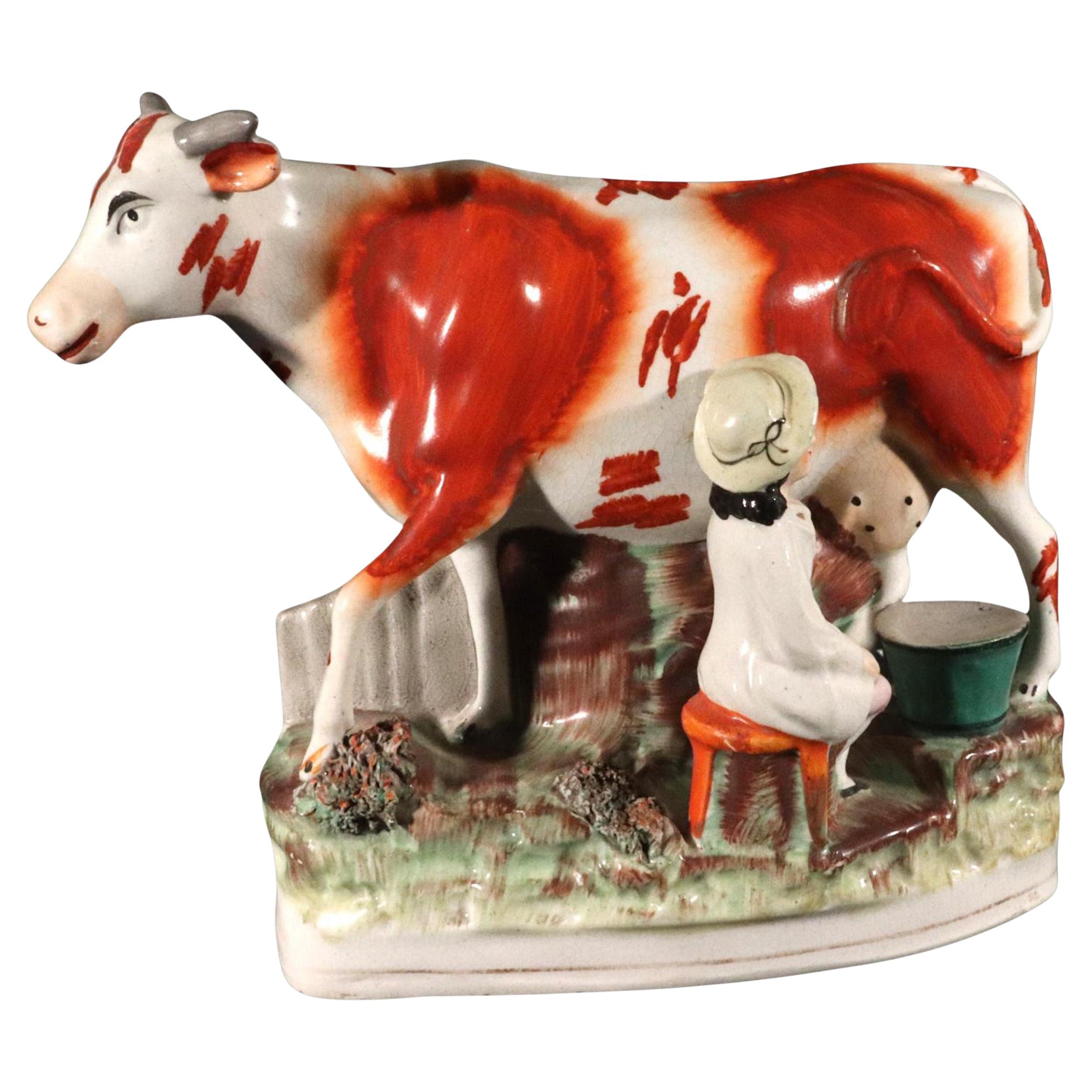 Figura de vaca de cerámica de Staffordshire con lechera