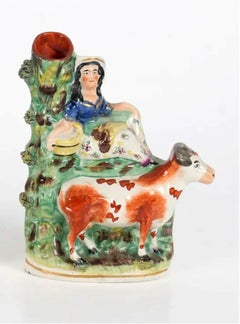 Staffordshire Pottery Cow with Figure of Milk Maid