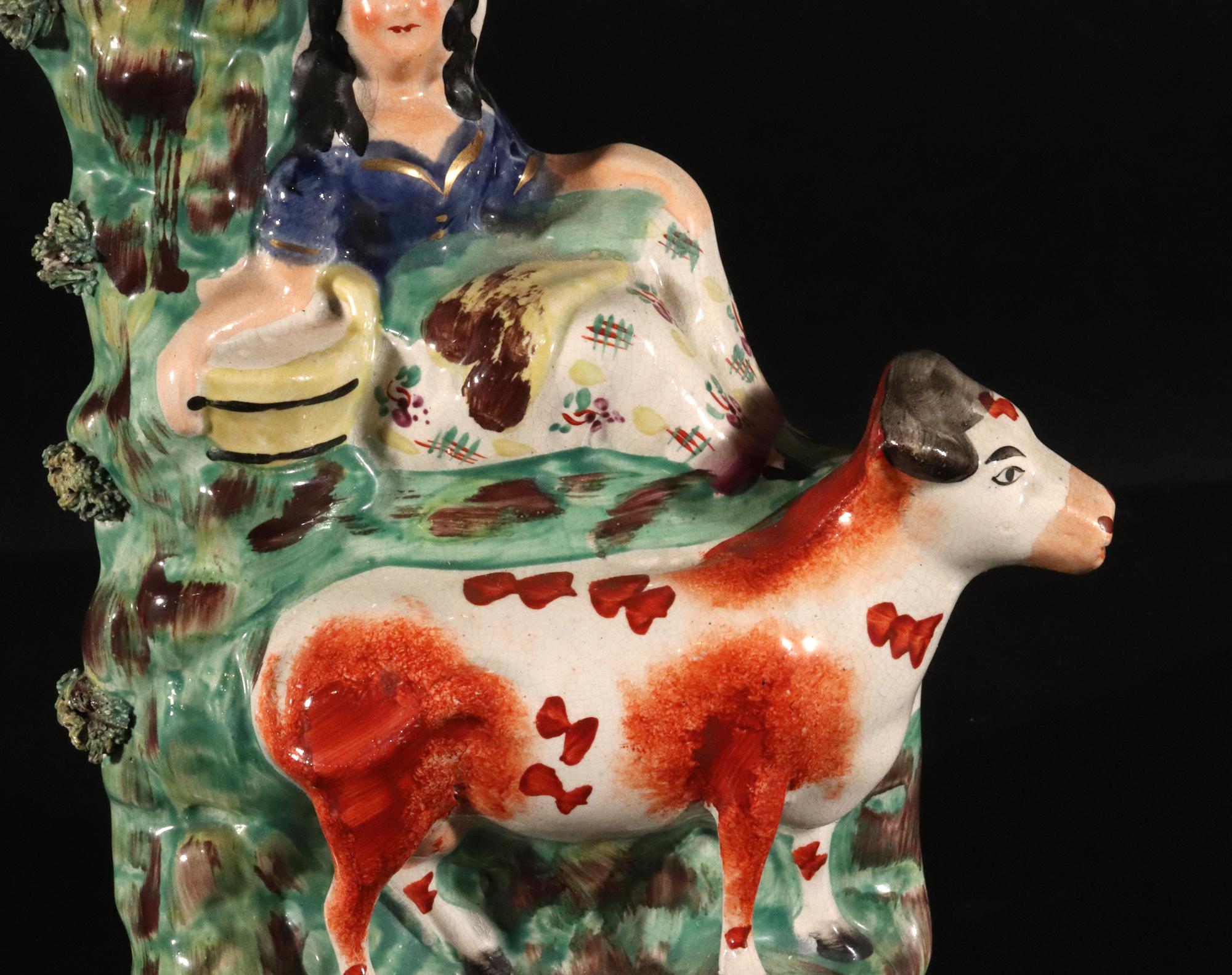 Staffordshire Pottery Cow with Figure of Milk Maid In Good Condition In Downingtown, PA