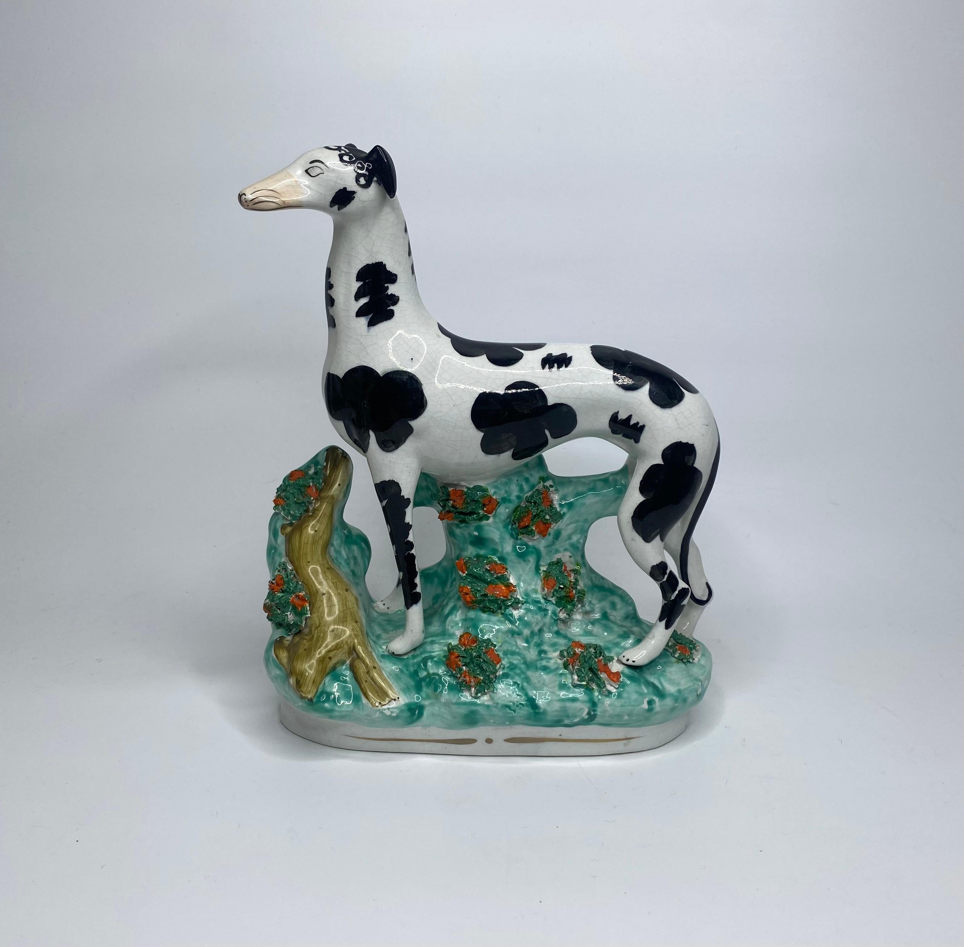 Victorian Staffordshire pottery Disraeli Curl Greyhounds, c. 1850.
