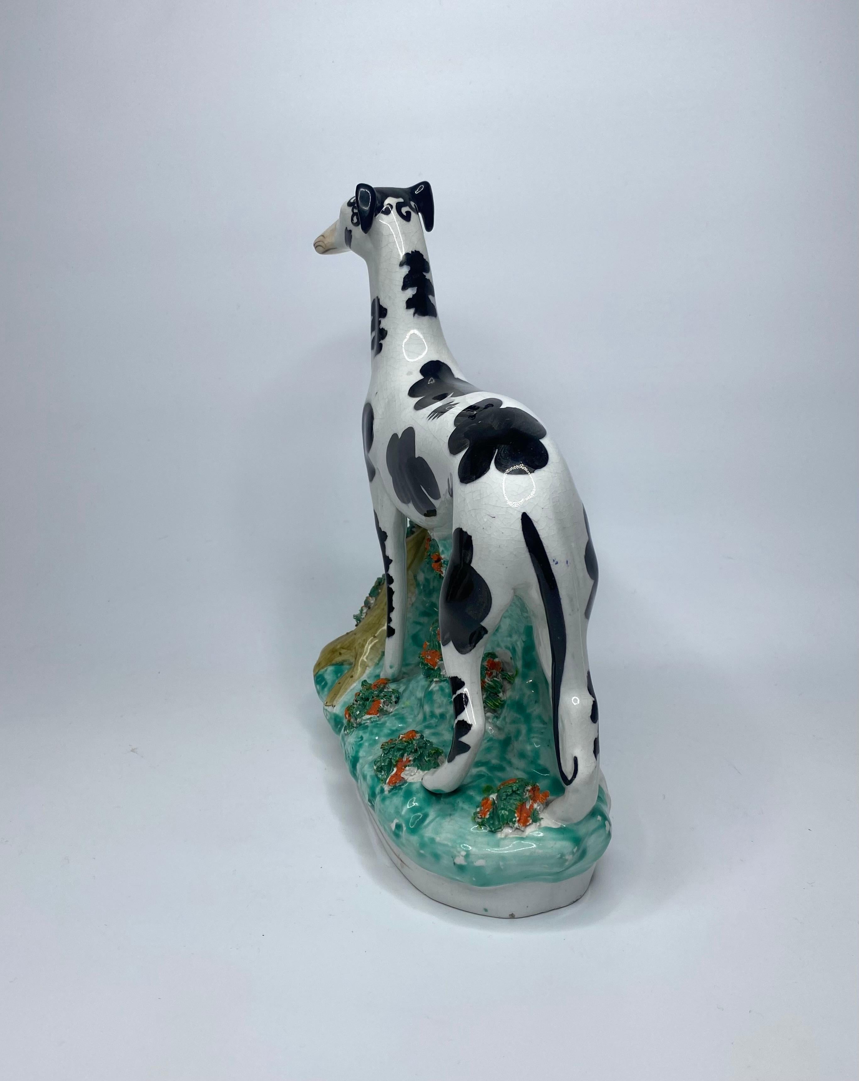 English Staffordshire pottery Disraeli Curl Greyhounds, c. 1850.