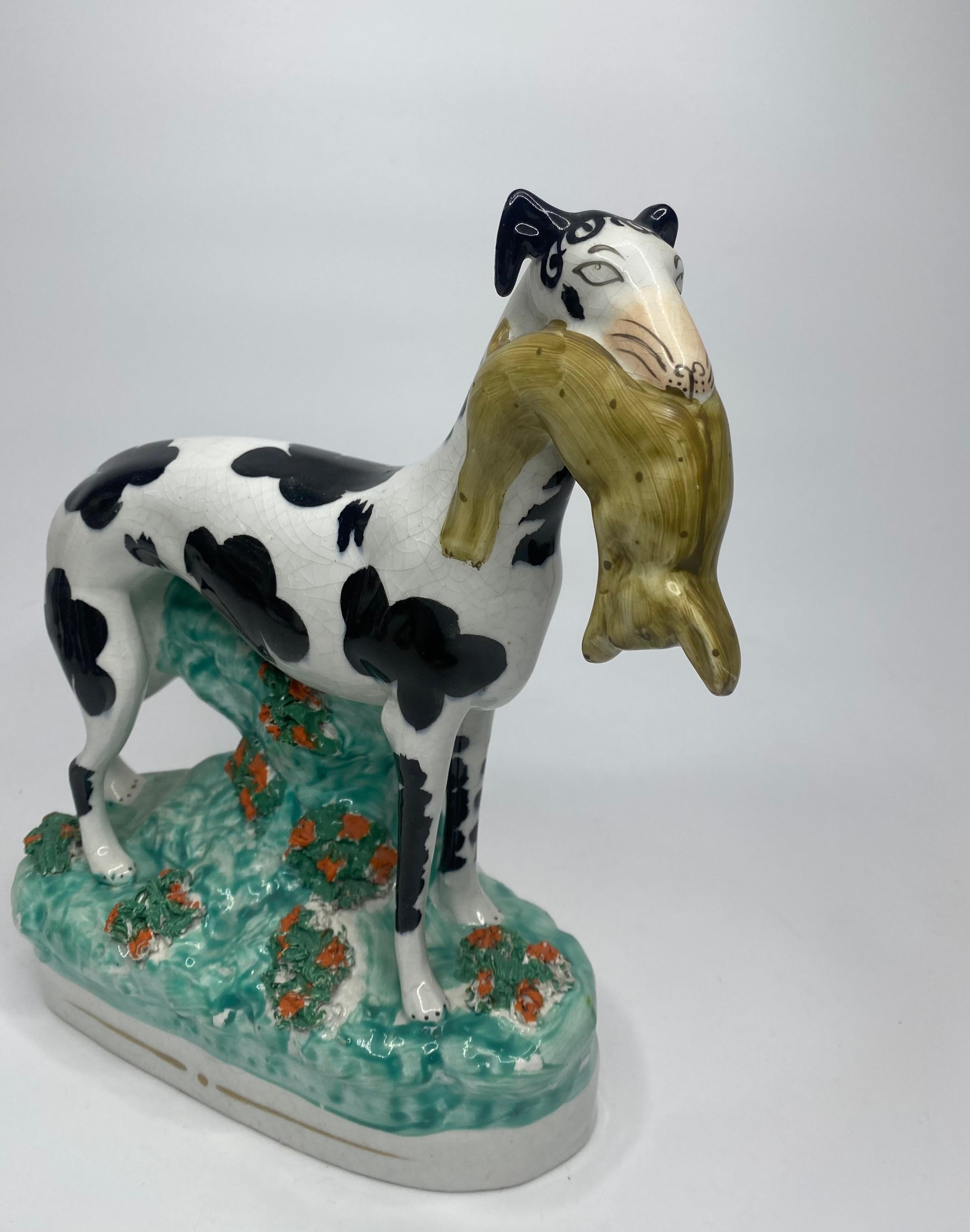 Mid-19th Century Staffordshire pottery Disraeli Curl Greyhounds, c. 1850.