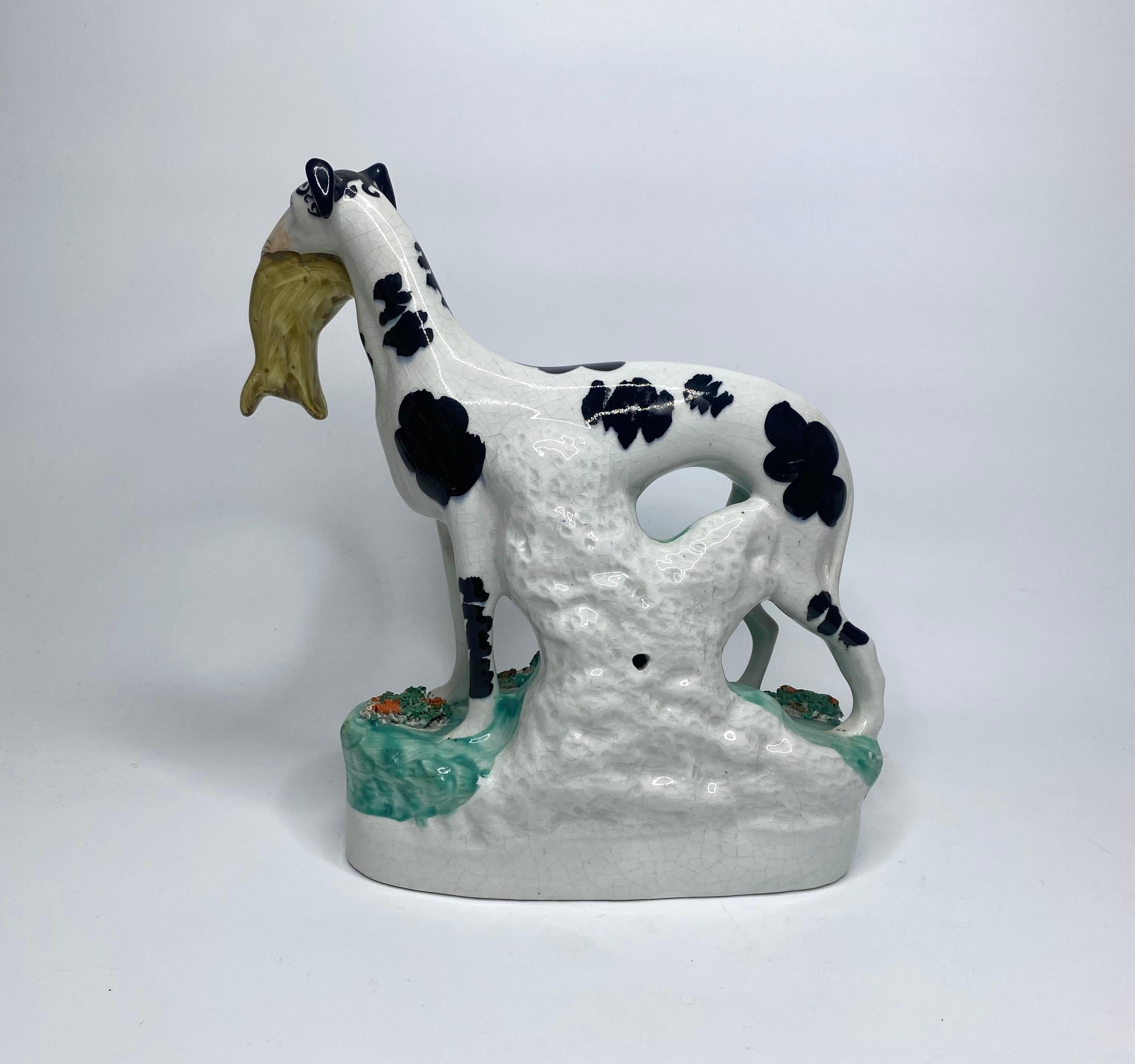 Pottery Staffordshire pottery Disraeli Curl Greyhounds, c. 1850.