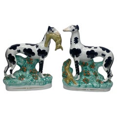 Staffordshire pottery Disraeli Curl Greyhounds, c. 1850.