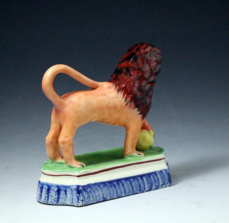 English Staffordshire Pottery Figure of a Lion with a Pearlware Glaze Early 19th Century