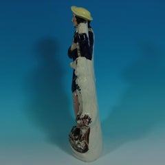 Staffordshire Pottery Figure of a Woodchopper Lumberjack