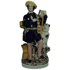 Antique Staffordshire Pottery Figure of a Woodchopper Lumberjack