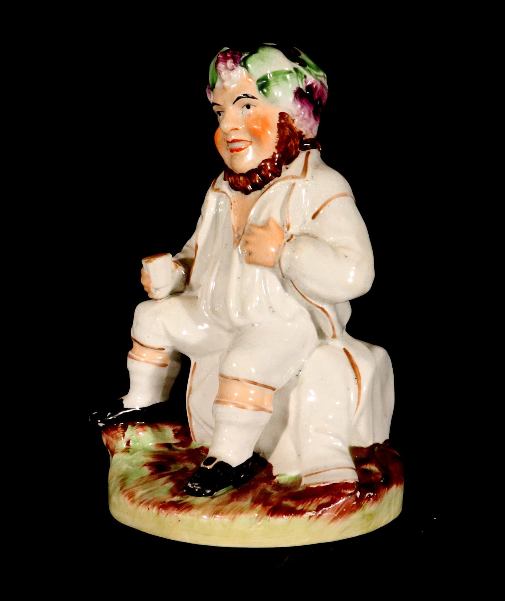 Victorian Staffordshire Pottery Figure of Bacchus With Cup on a Wine Barrel For Sale
