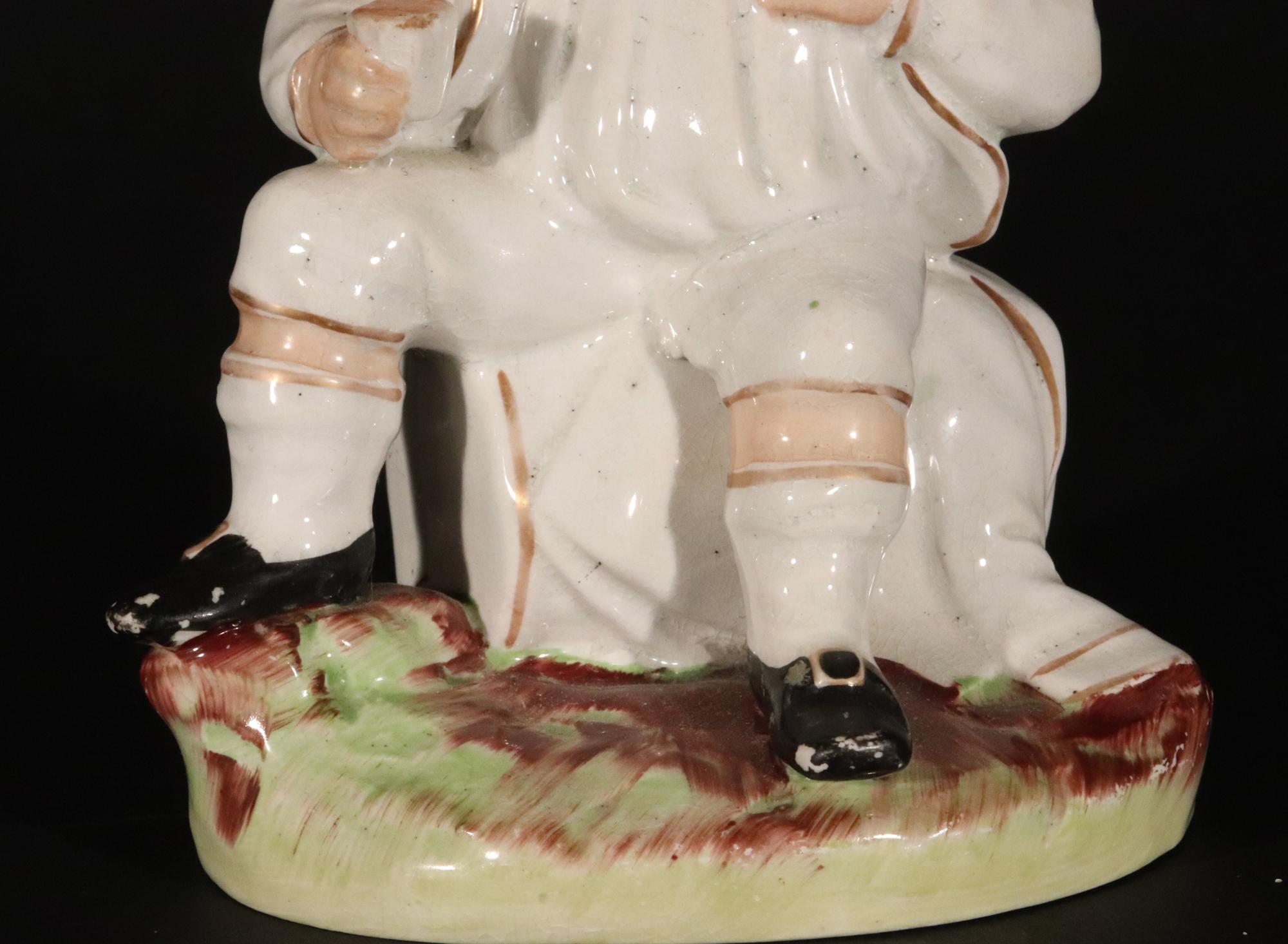 19th Century Staffordshire Pottery Figure of Bacchus With Cup on a Wine Barrel For Sale