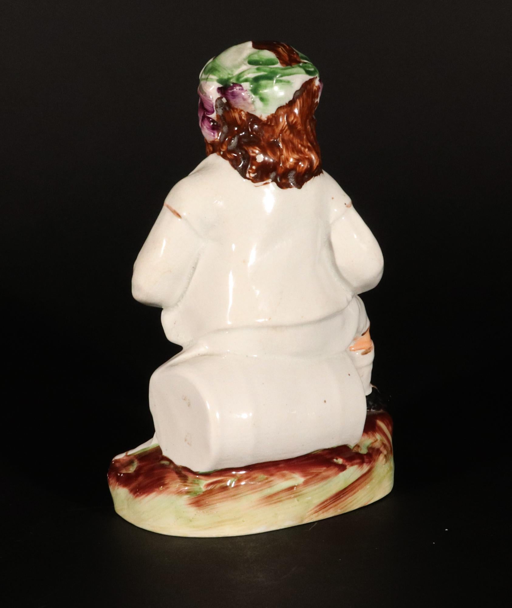 Staffordshire Pottery Figure of Bacchus With Cup on a Wine Barrel For Sale 1