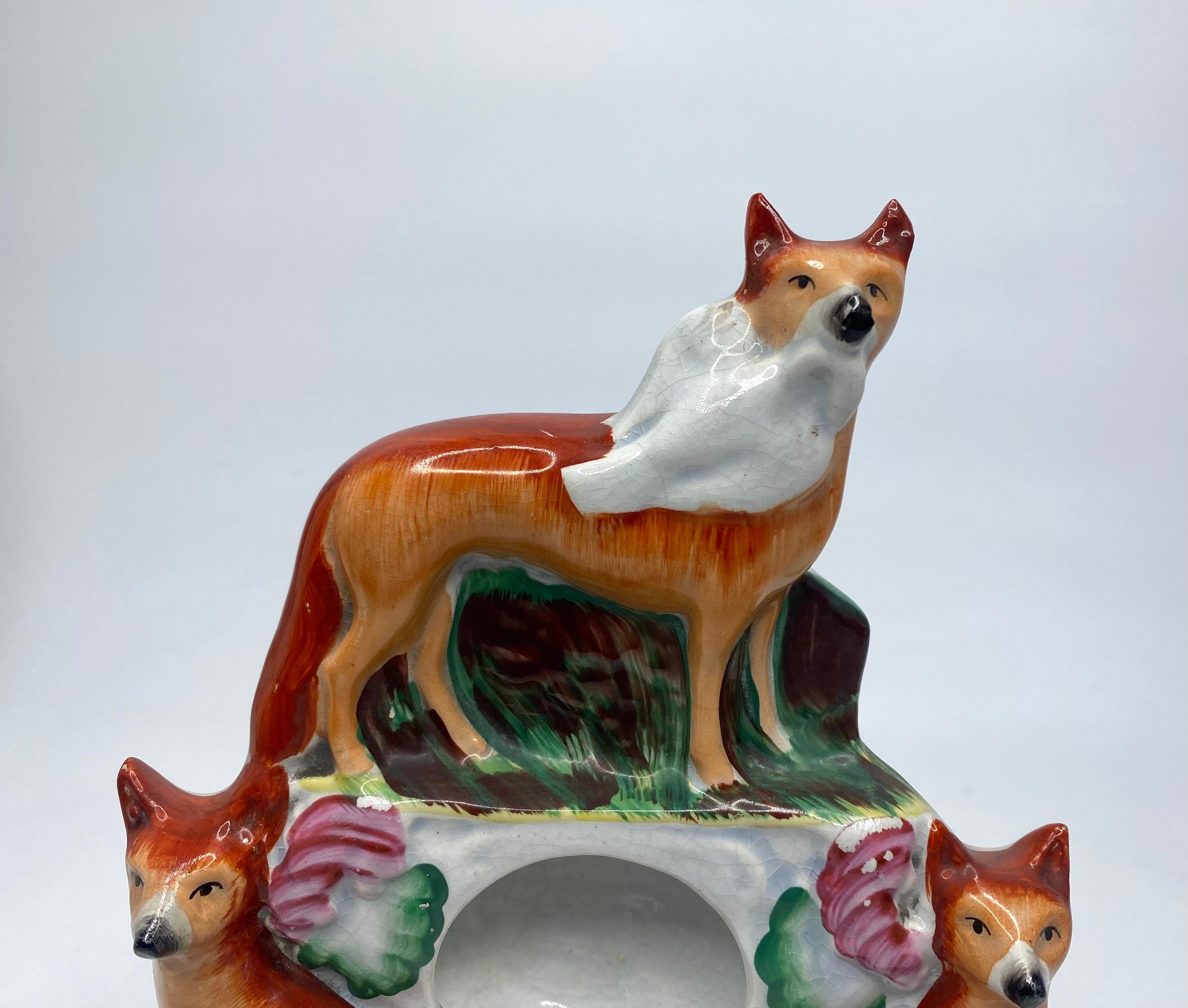 Fired Staffordshire pottery Foxes watch holder, c. 1860. For Sale