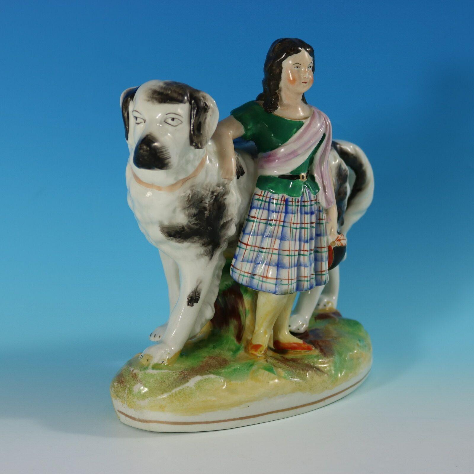 Parr Factory Staffordshire figure with a childhood theme which features the a girl, standing in front of a St. Bernard dog, stood on an oval base. Dull gilt base line and embellishment. Decorated 'in the round' - decoration to front and reverse.