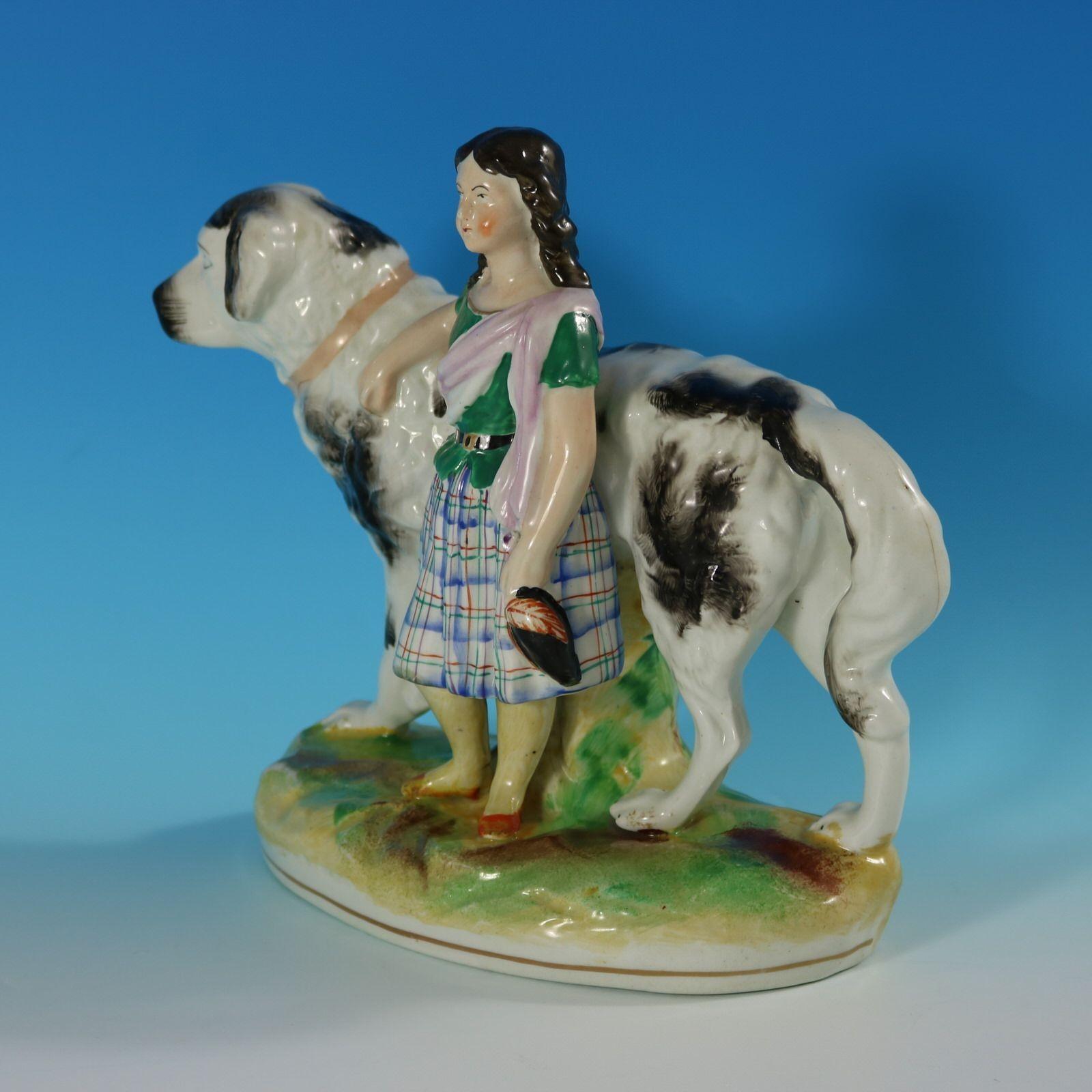 Earthenware Staffordshire Pottery Girl with St. Bernard Figure For Sale