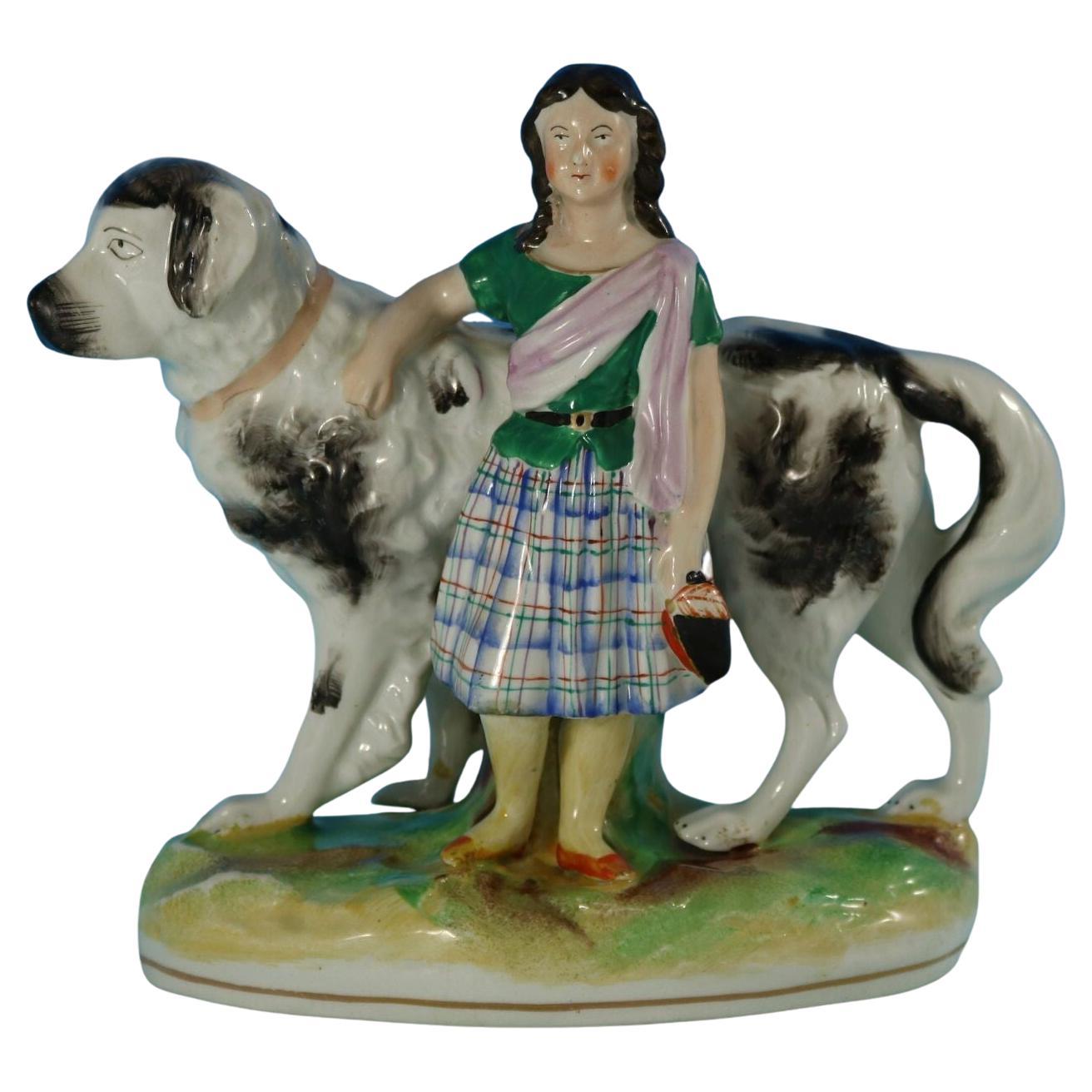 Staffordshire Pottery Girl with St. Bernard Figure For Sale