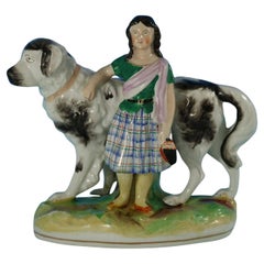 Antique Staffordshire Pottery Girl with St. Bernard Figure