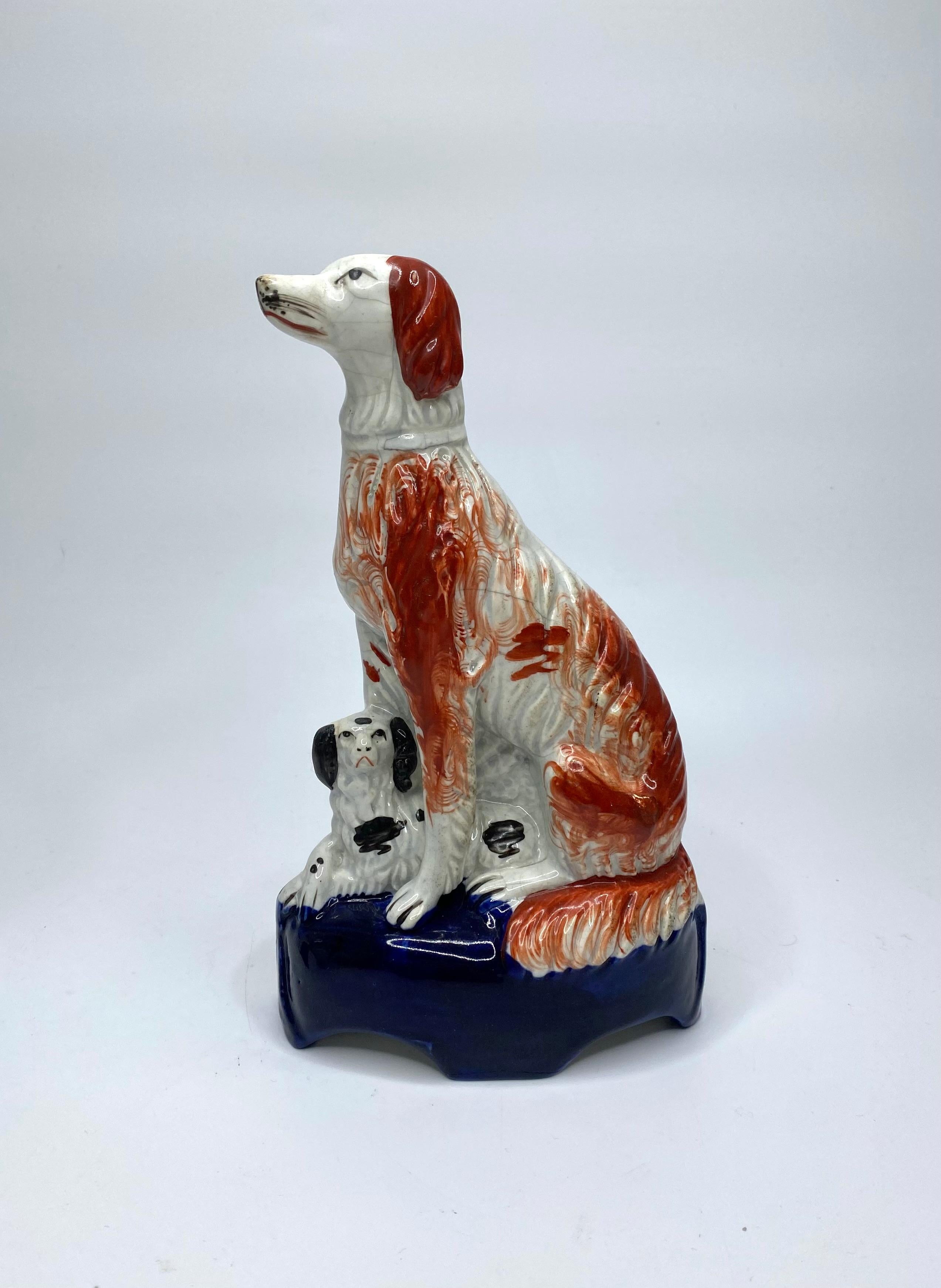 Victorian Staffordshire pottery Irish Setters, and puppies, c. 1850. For Sale