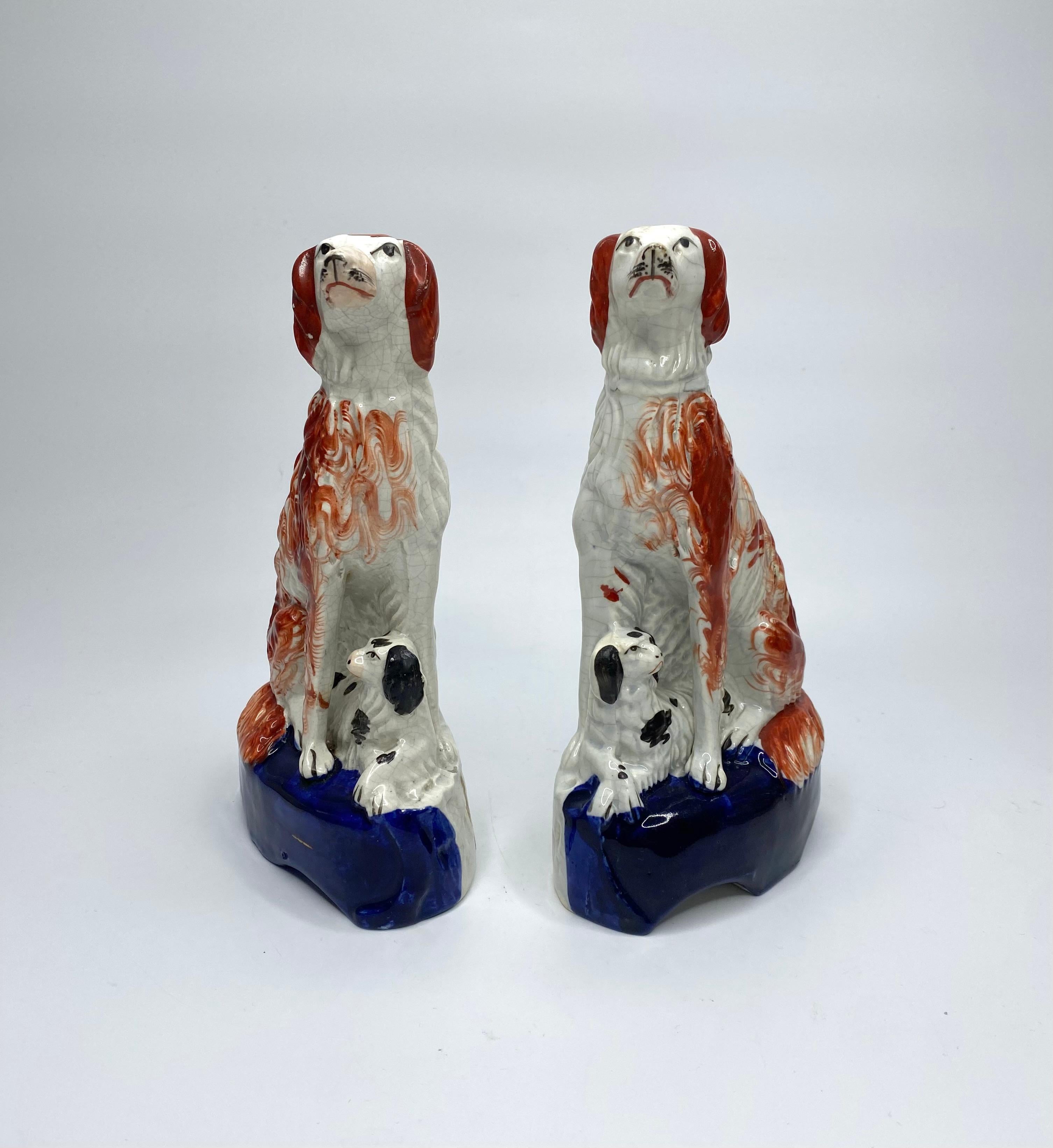 English Staffordshire pottery Irish Setters, and puppies, c. 1850. For Sale