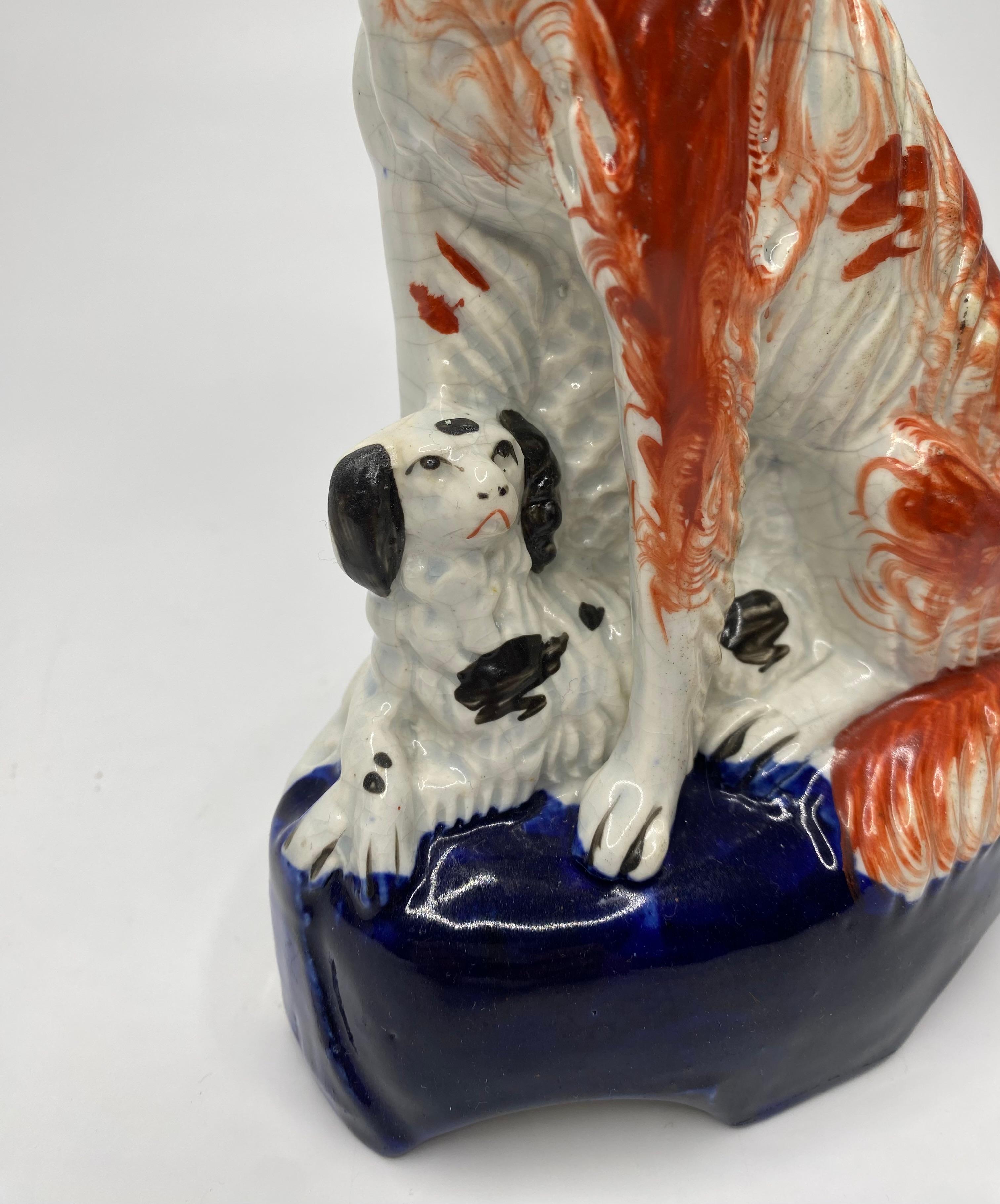 Pottery Staffordshire pottery Irish Setters, and puppies, c. 1850. For Sale