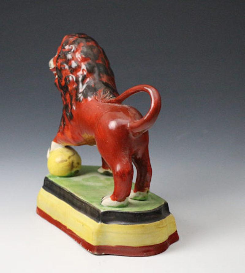 English Staffordshire Pottery Pearlware Figure of a Standing Lion on Base For Sale