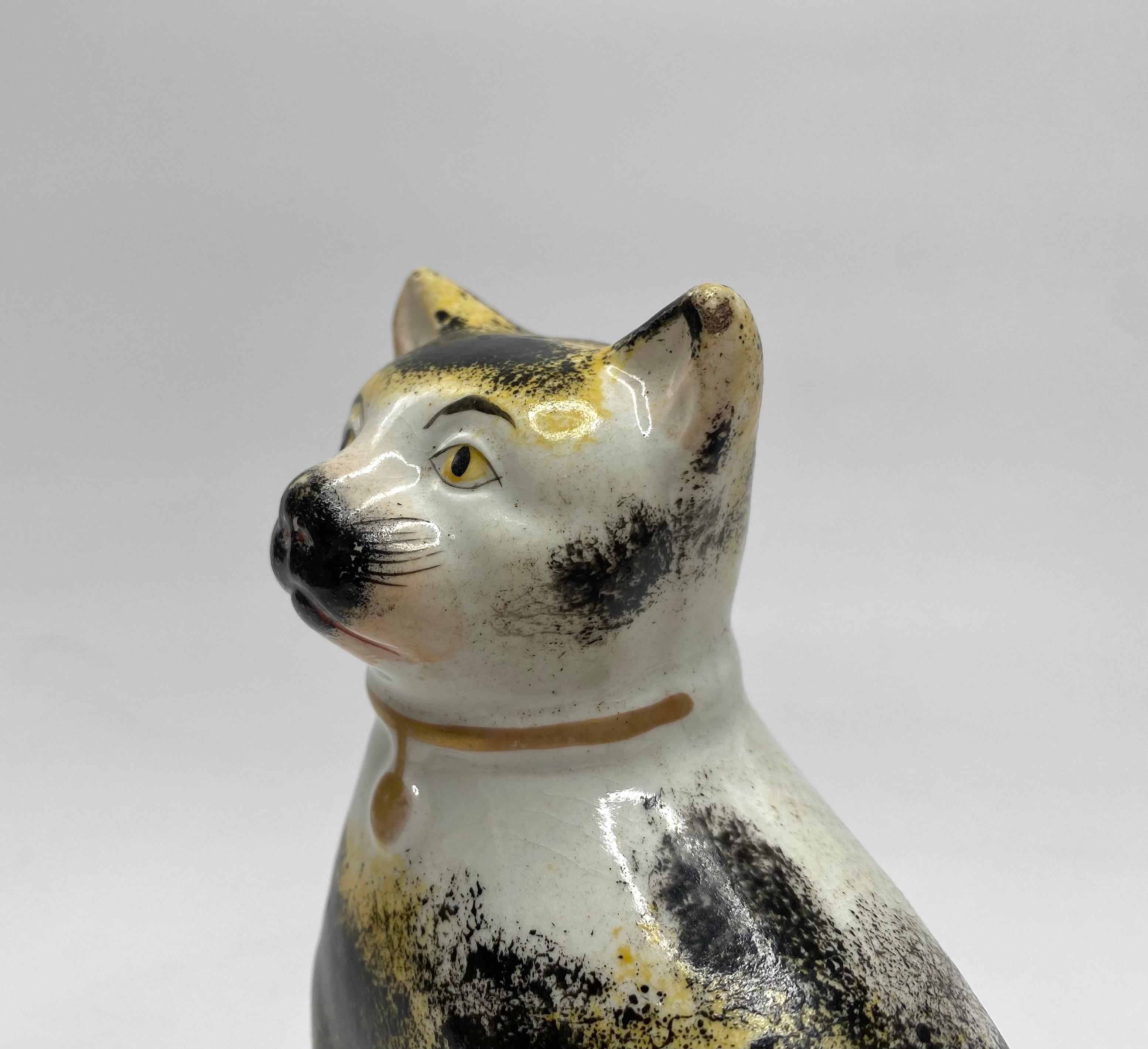 Fired Staffordshire pottery seated cat, c. 1850.