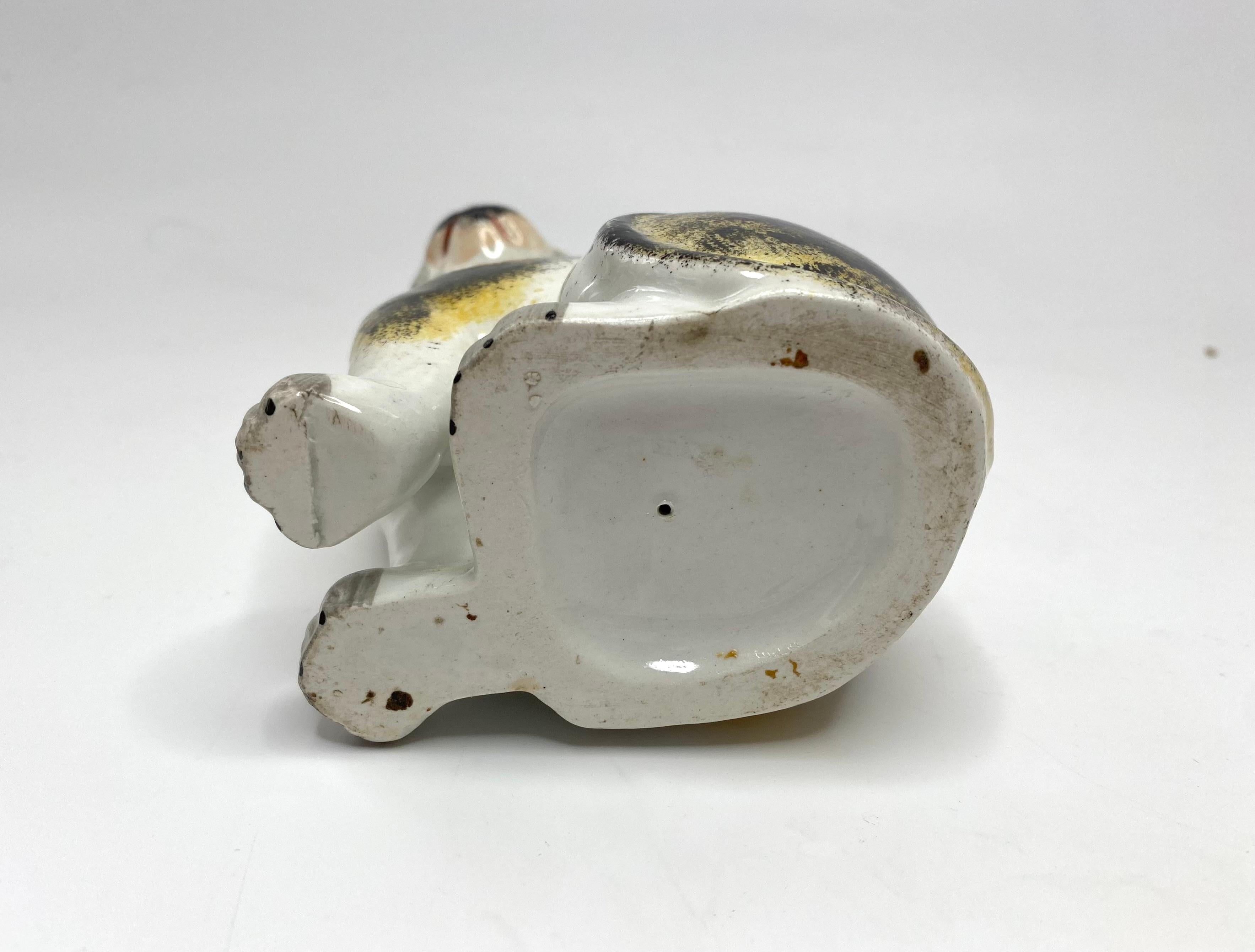 Mid-19th Century Staffordshire pottery seated cat, c. 1850.