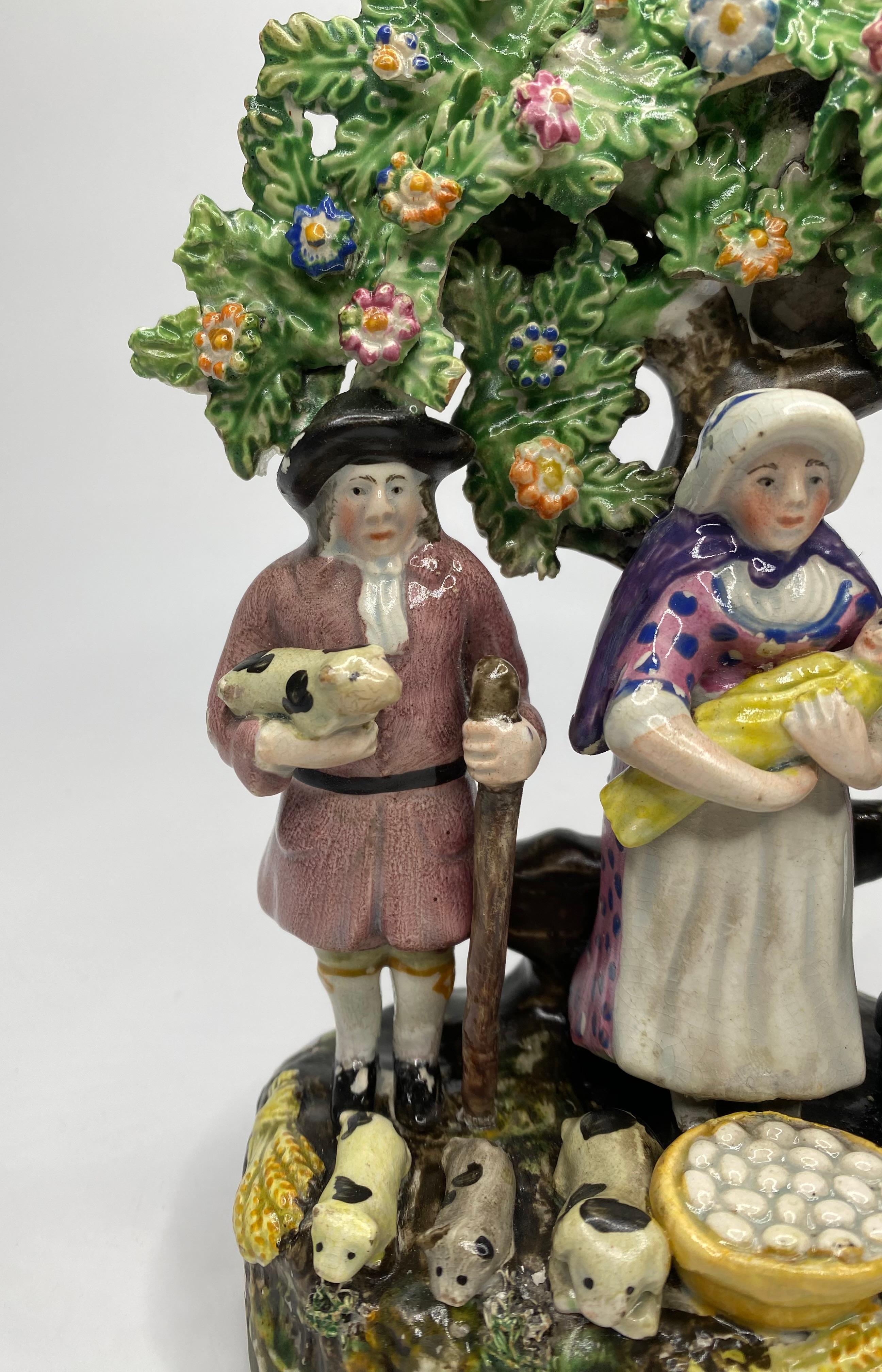 Staffordshire pottery Tithe Pig bocage group, c. 1830. In Good Condition In Gargrave, North Yorkshire