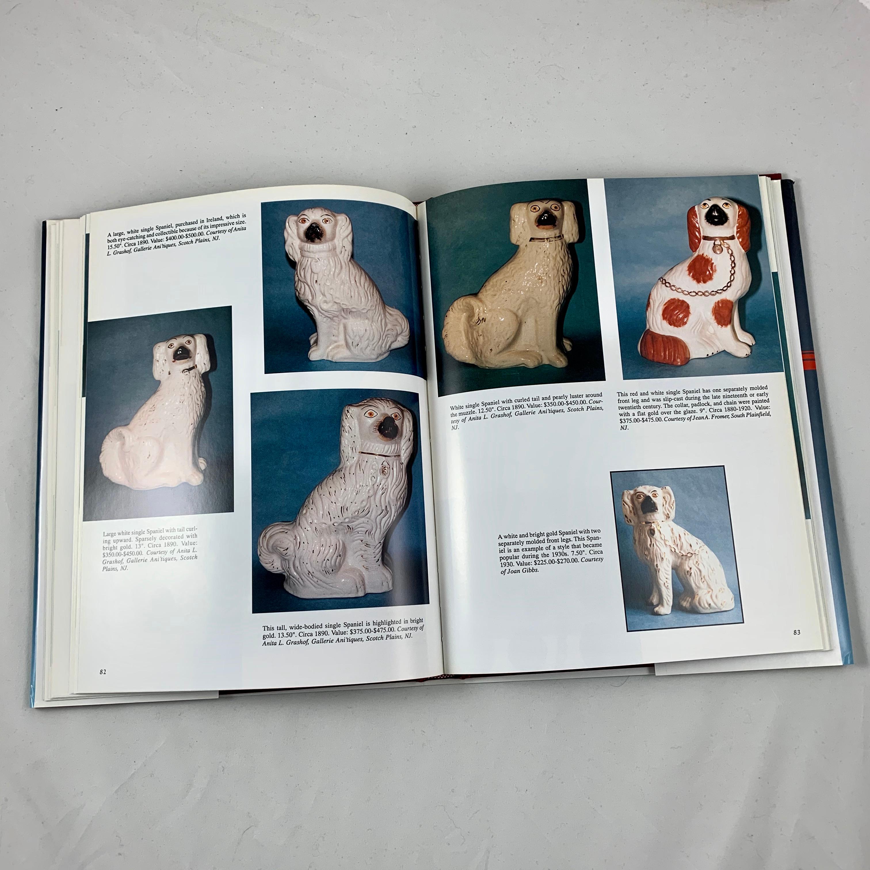 Staffordshire Spaniels, a Collectors Guide to History, Styles, and Values by Adele Kenny, first edition with dust jacket – 1997.

Antique spaniel figures were produced in Staffordshire, England from circa 1840 through the turn of the century.