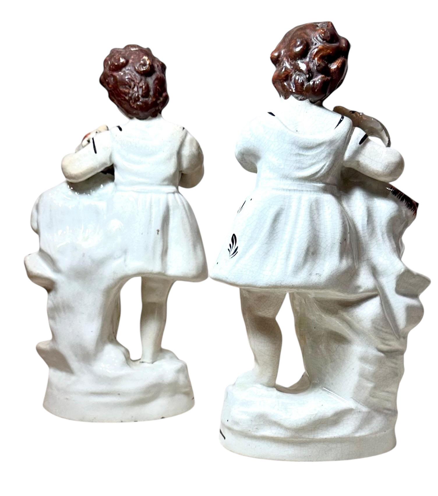 Staffordshire Statues Children With Goats In Good Condition For Sale In Tampa, FL