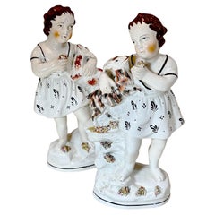 Estatuas de Staffordshire Niños con cabras