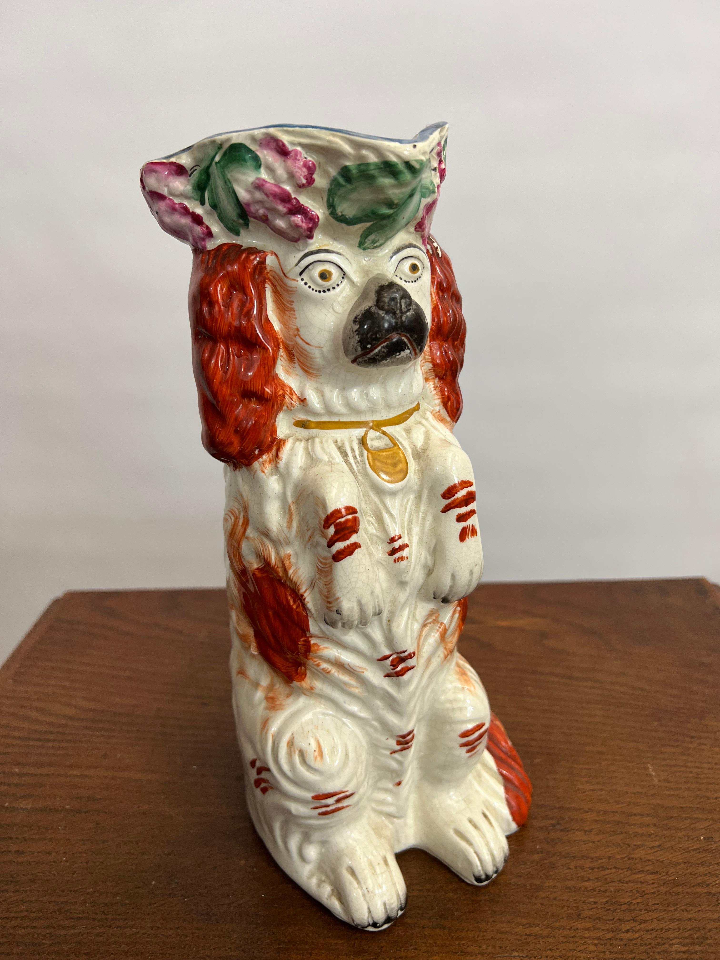 Antique Staffordshire Pottery Spaniel Water Jug circa 1850
English Staffordshire Begging Spaniel Dog Jug Red & White
ref 3075
very well modelled and richly decorated capturing the Spaniel
in alert posture , and presented in very good condition

high