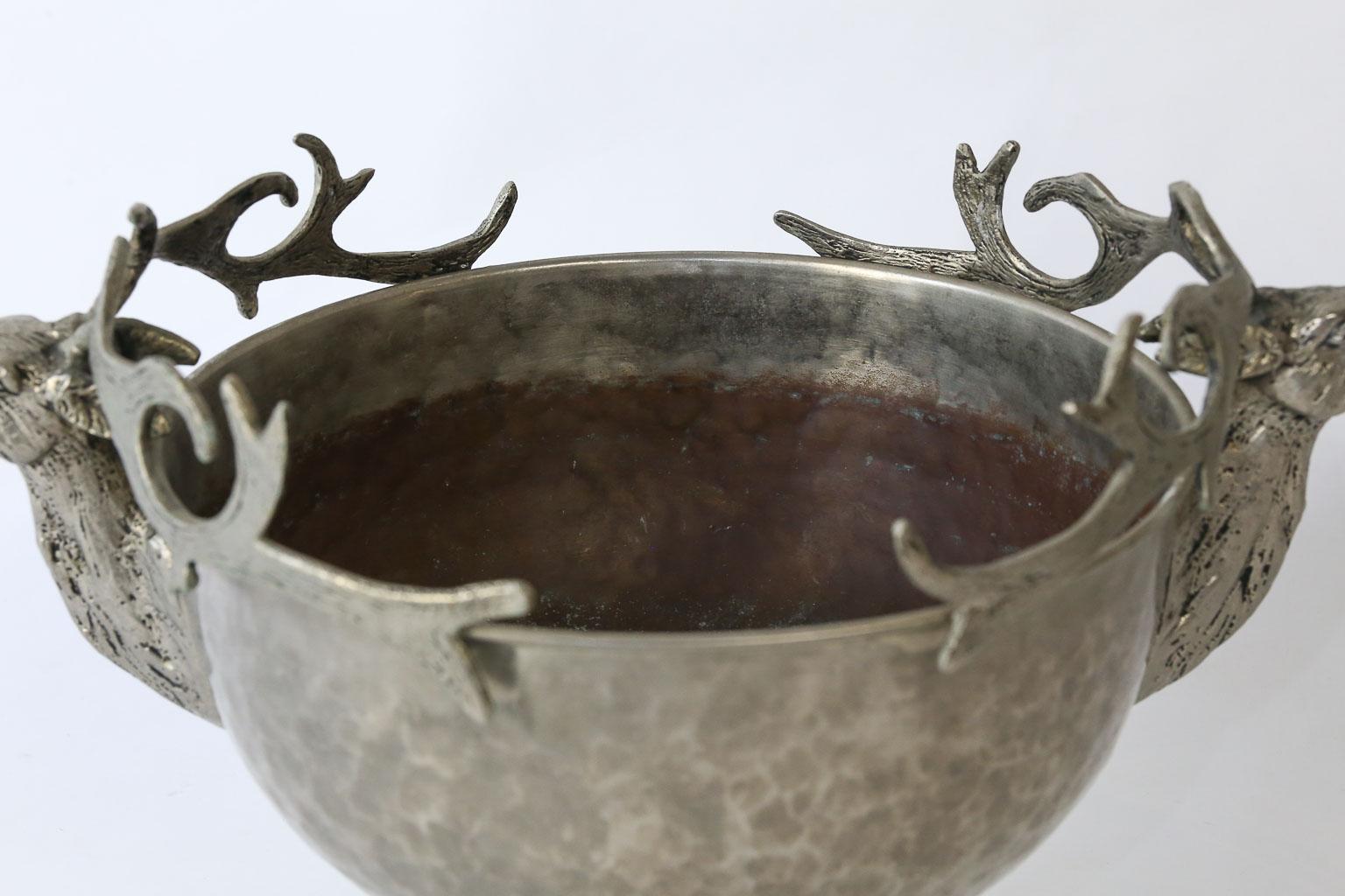 footed metal bowl