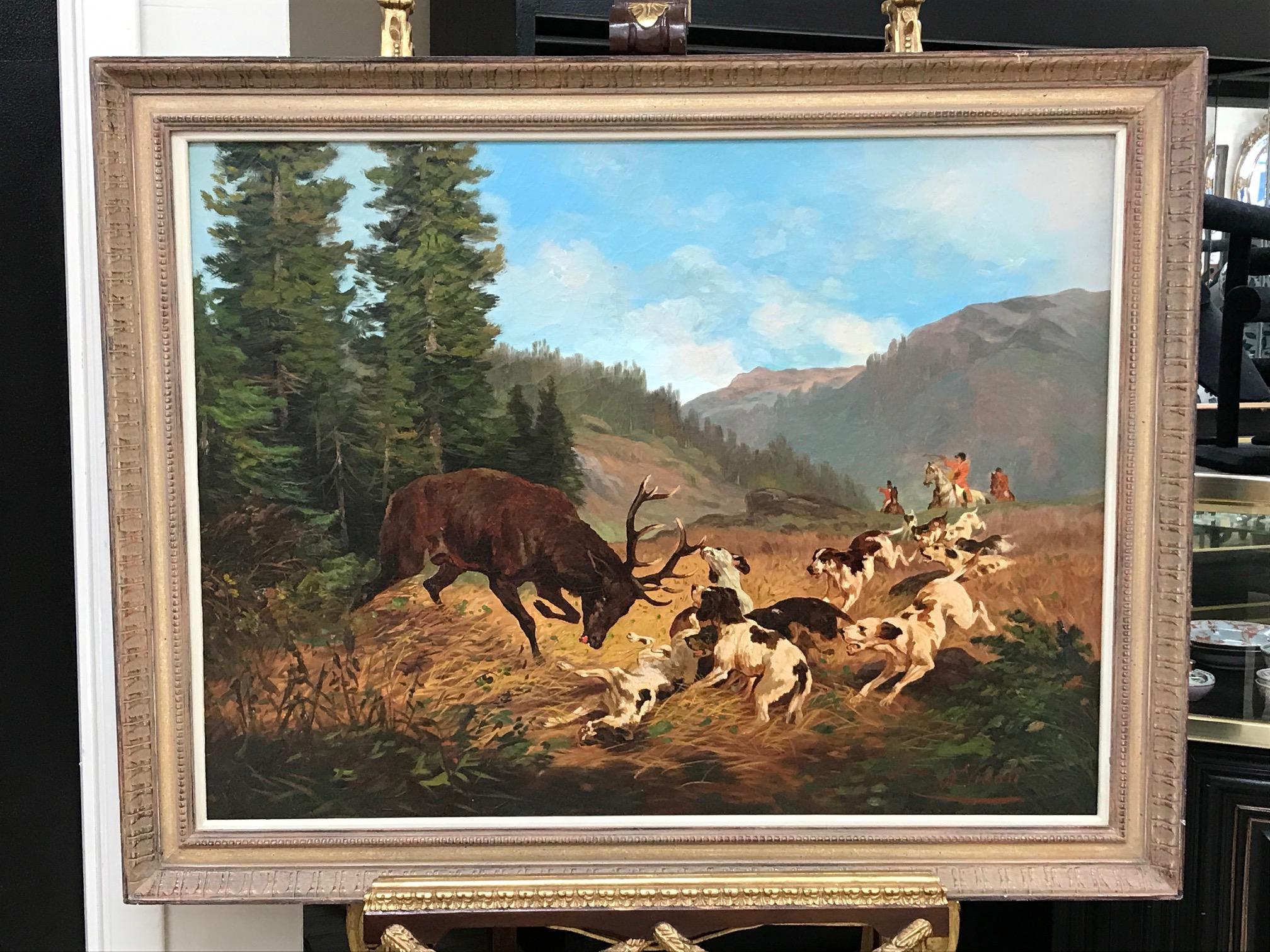 Signed (lower right hand corner) oil painting depicting a stag hunt. The hunters on horseback in the background roaming in the countryside are overlooking the stag and hounds. It is not the original frame.