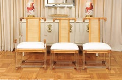 Staggering Restored Set of 12 Iconic Lucite and Rattan Dining Chairs, circa 1975