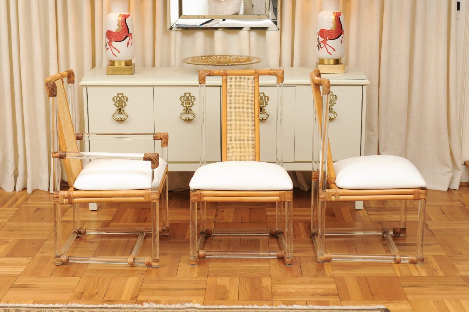 American Staggering Restored Set of 12 Iconic Lucite and Rattan Dining Chairs, circa 1975