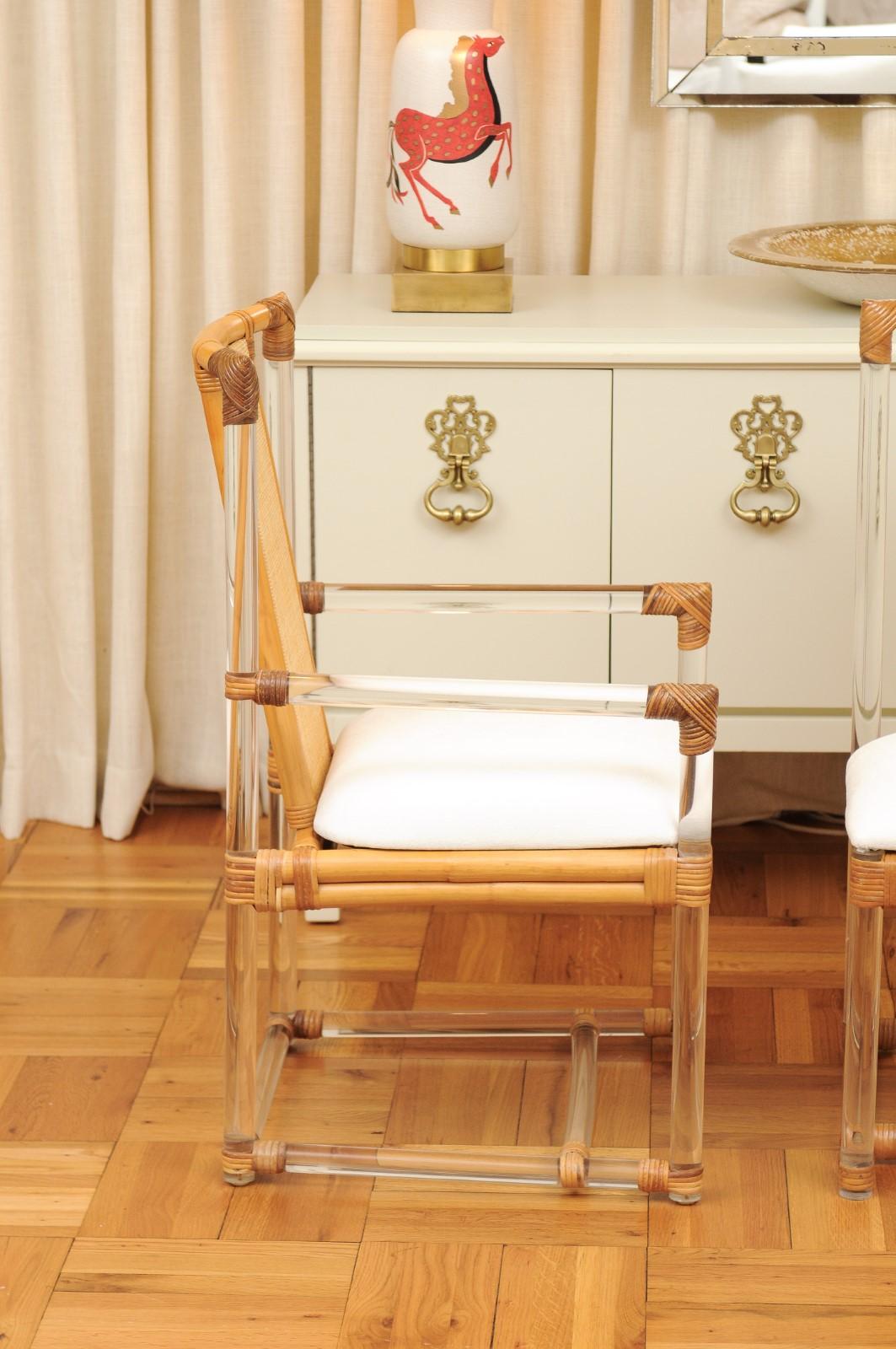 Late 20th Century Staggering Restored Set of 12 Iconic Lucite and Rattan Dining Chairs, circa 1975