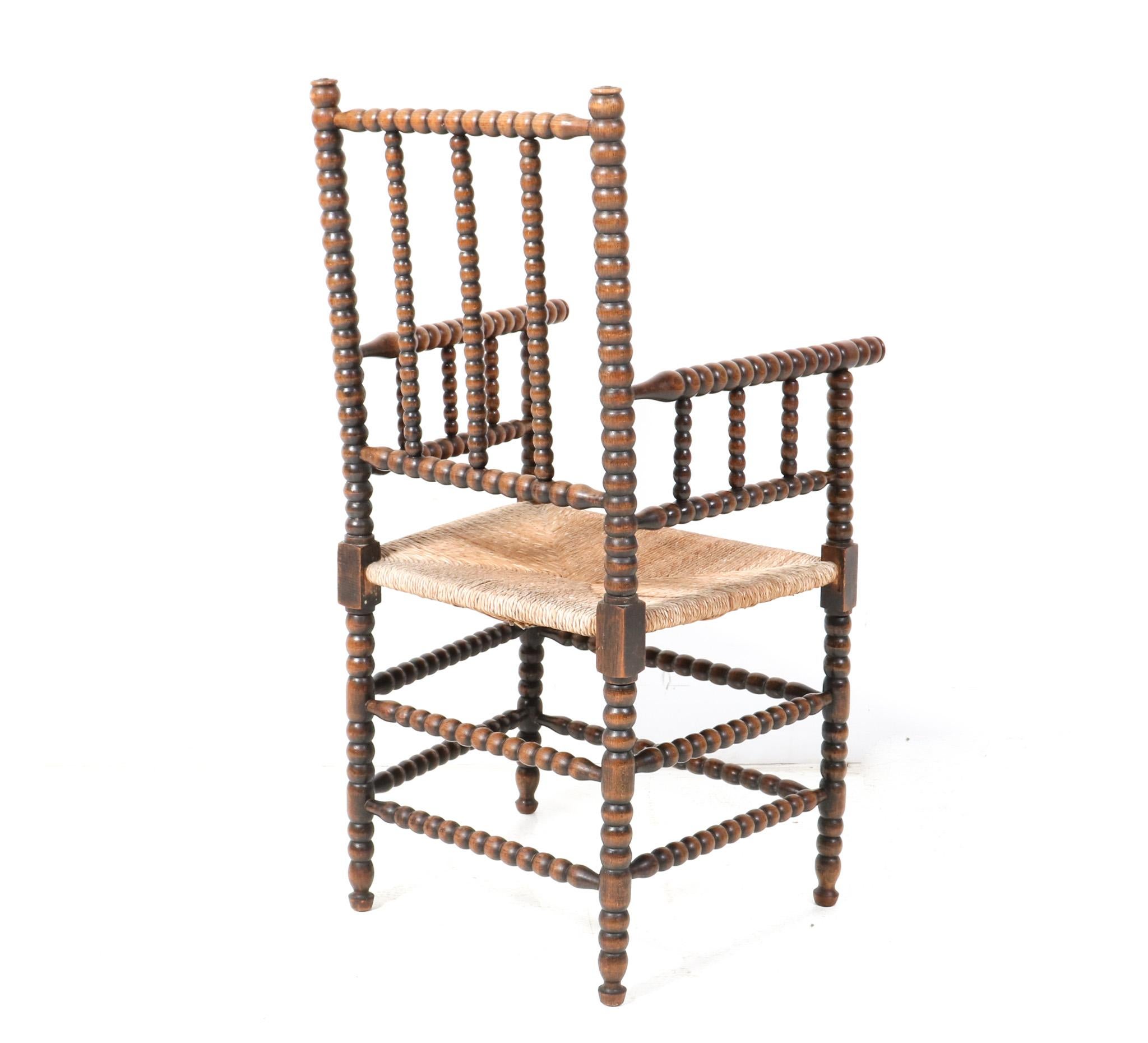 Early 20th Century Stained Beech Jacobean Style Bobbin Armchair, 1900s For Sale