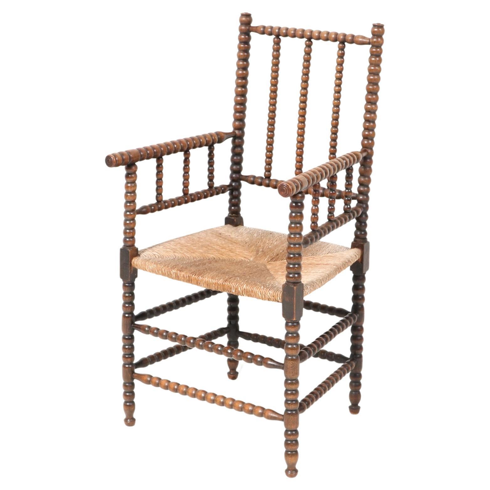 Stained Beech Jacobean Style Bobbin Armchair, 1900s For Sale