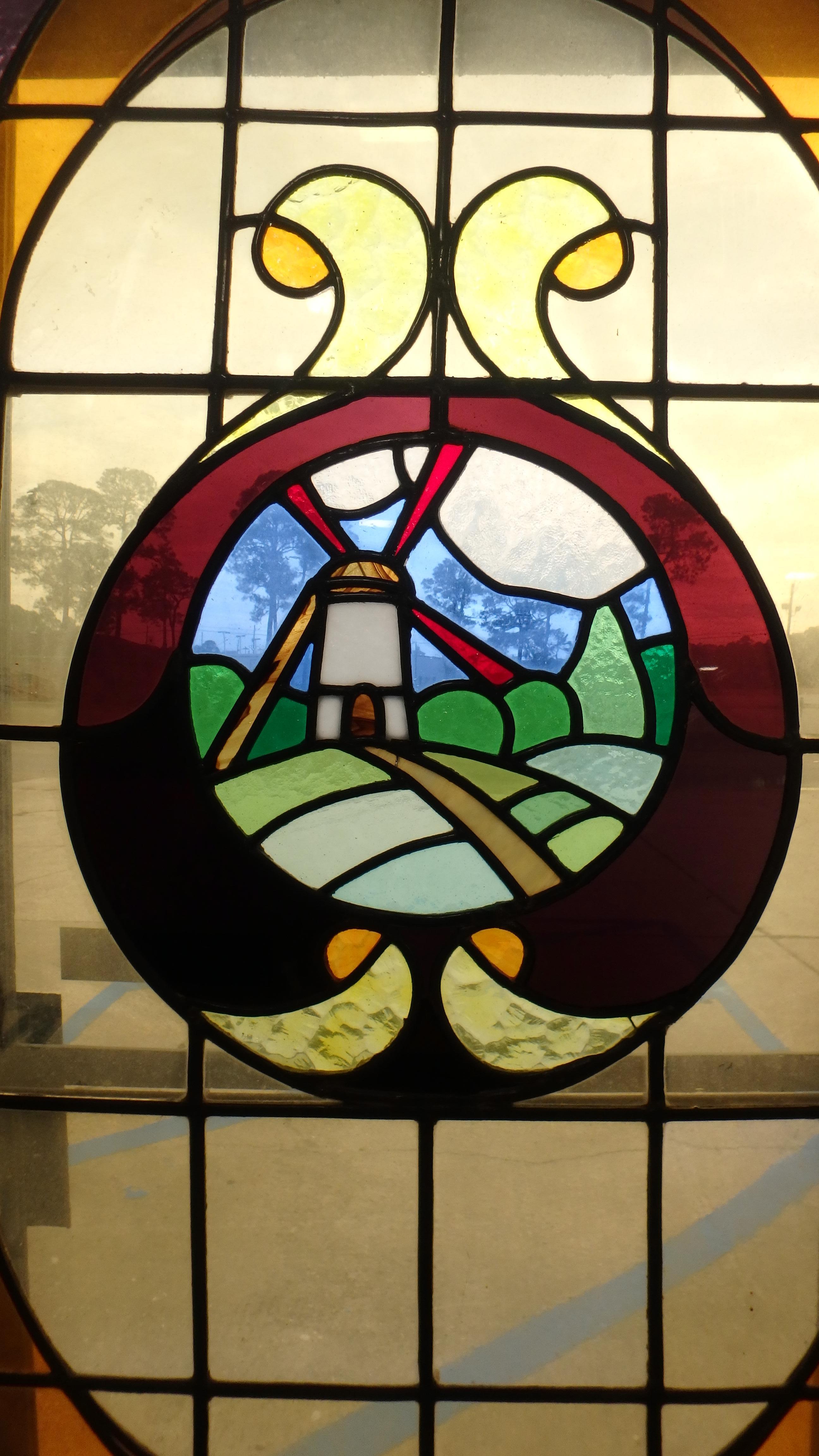 Beautiful stained glass door with windmill scene from Holland.
