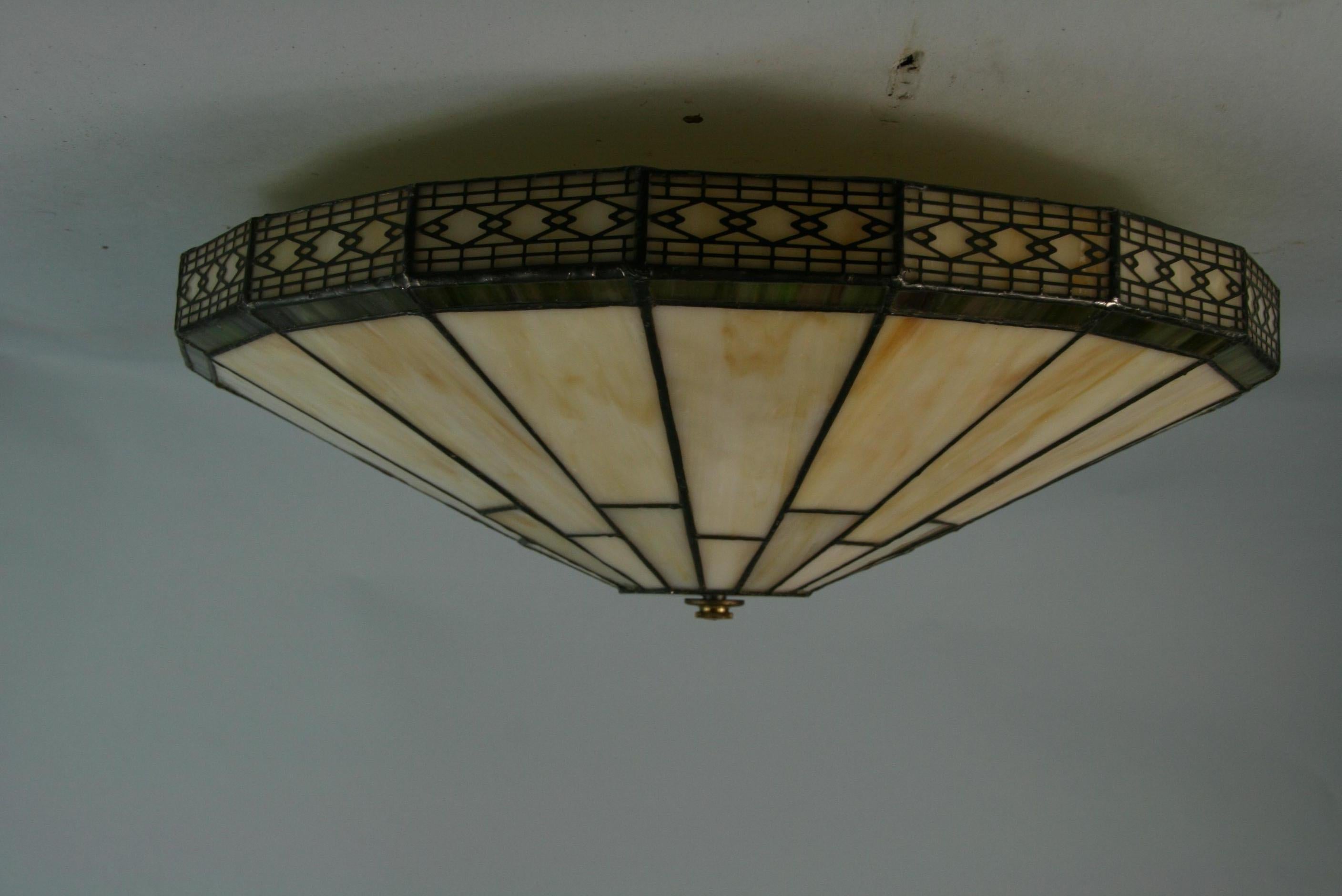 3-813 stain glass flush mount
Rewired 
Takes 3 Edison based bulbs 60 watt max.
  