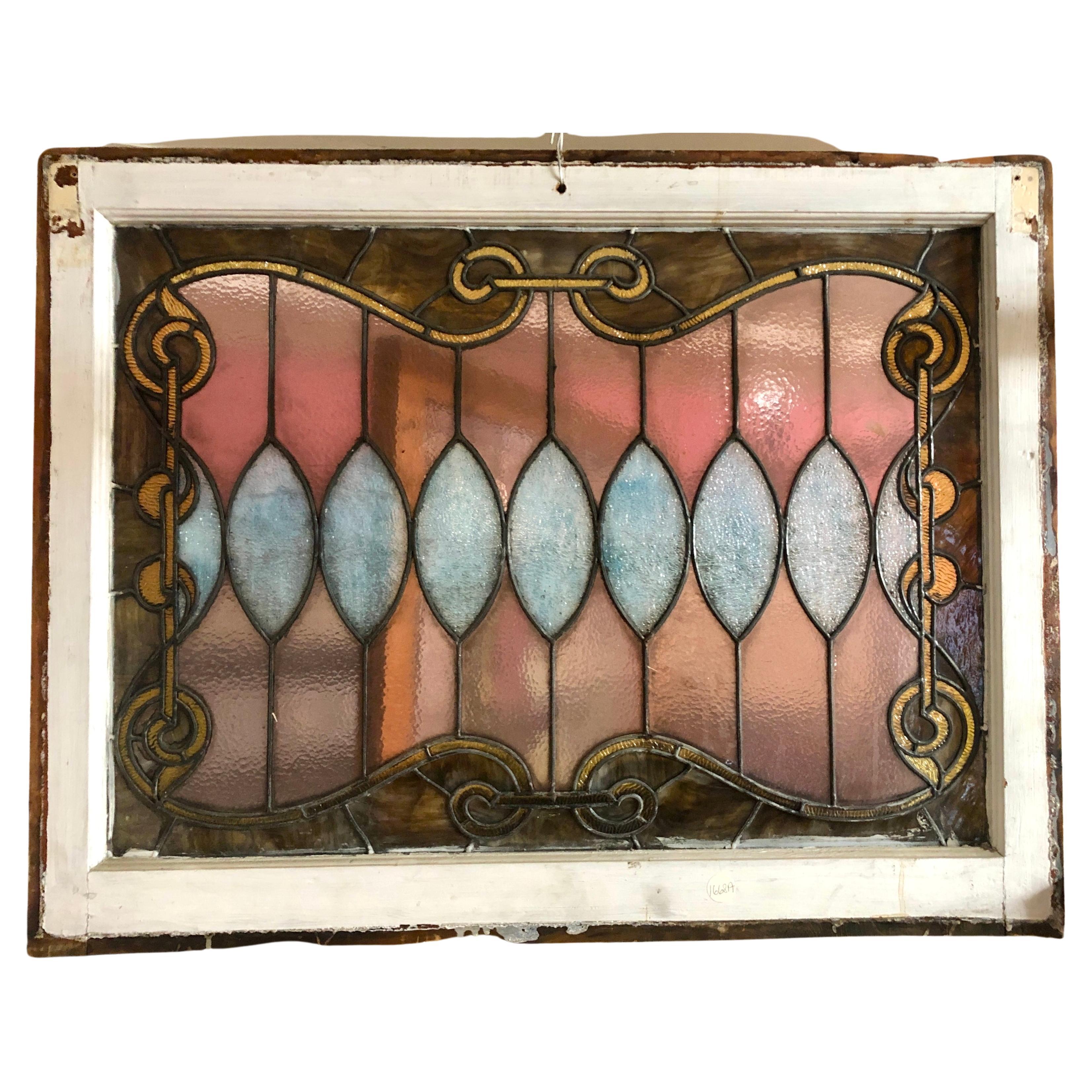American turn of the century window with stained glass and leaded decoration. Beautiful colors to brighten your room!
Currently housed in a temporary wooden frame - the overall dimensions are for the stained glass and the frame.
Located in NY