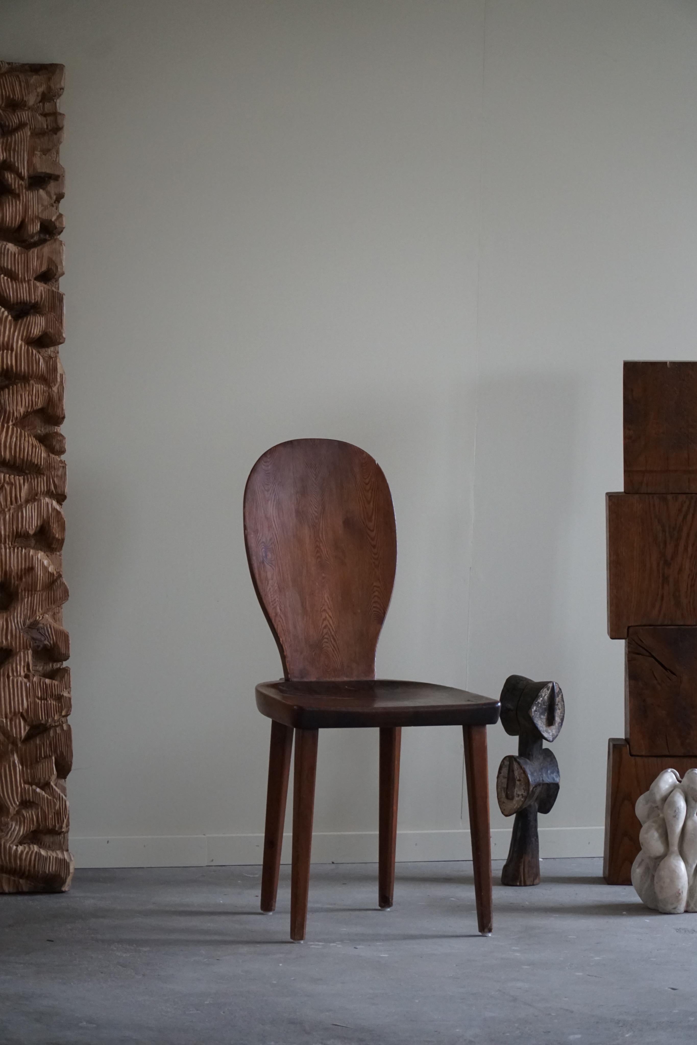 A rare dining / office chair in stained pine. Designed by Carl Malmsten in 1930s. Model 