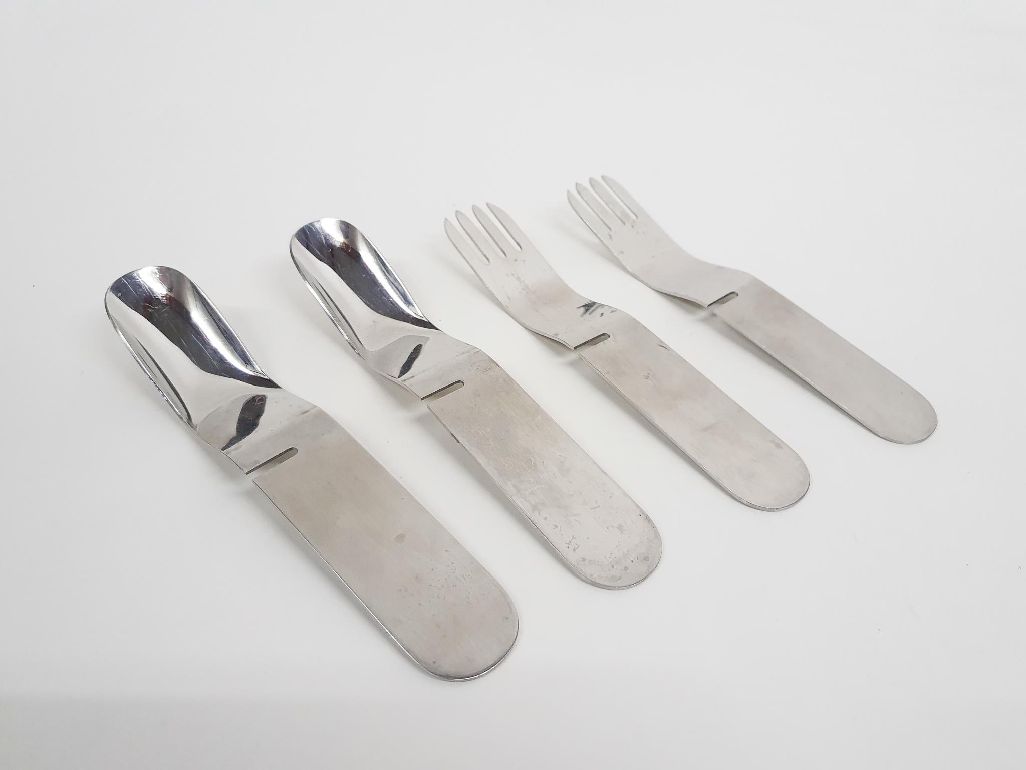 This rare set comes from the La Bomba picnic sets designed by Helen von Boch and Federigo Fabbrini. The set normally comes in a set of 4 ( 4x knife, spoon, fork, and teaspoon). We only have 2 spoons and 2 forks. They are interlocking and nesting.