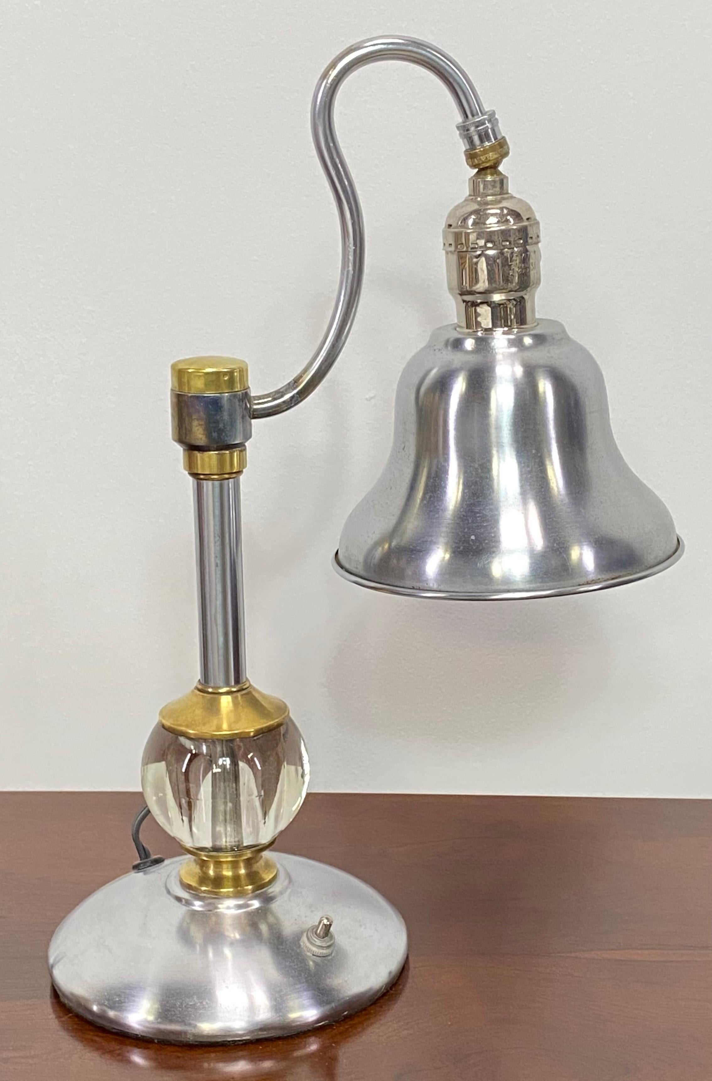 A stainless steel and brass table lamp. 
Recently restored and re-wired.
American 1950's-1960's.
