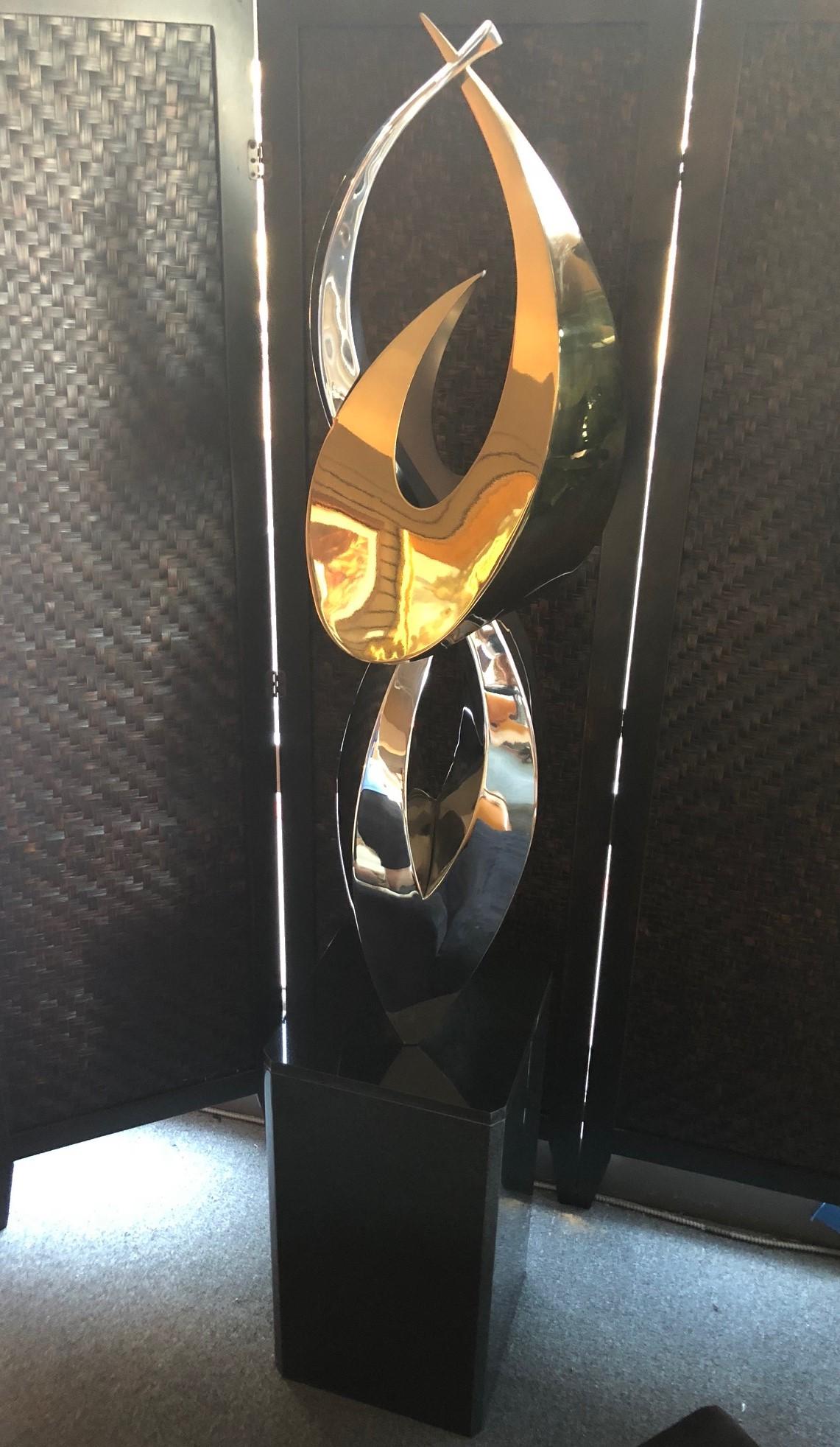 Gorgeous stainless steel and bronze sculpture entitled 
