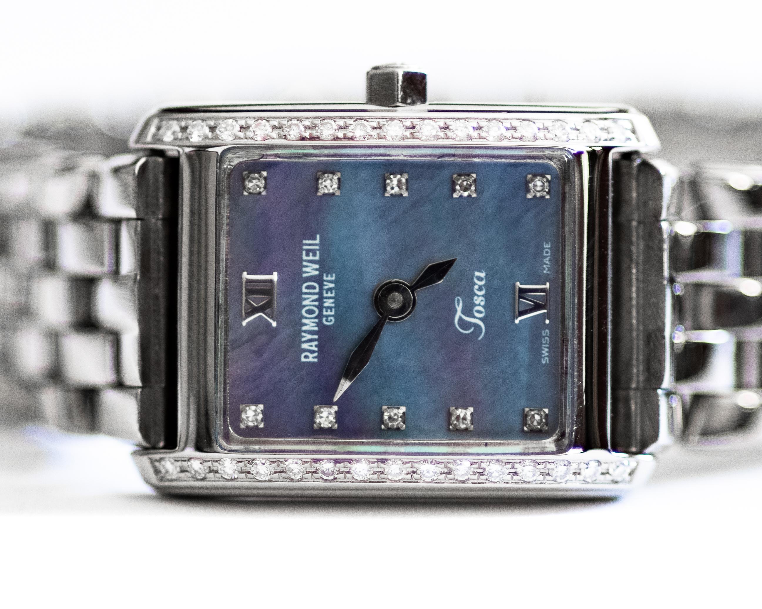 Item Description:
Metal type: Stainless Steel
Weight: 42 grams
Fits a 7 inch wrist 
From the 1990s

This is a stunning women's wristwatch from the iconic brand, Raymond Weil Tosca. 
The watch features a mother of pearl dial with diamond accents and