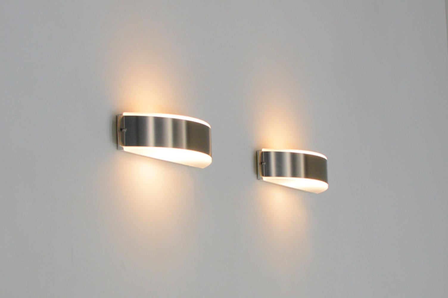 Stainless steel and glass wall lamps made by Glashütte Limburg, 1970s Germany. In Good Condition For Sale In Landgraaf, NL
